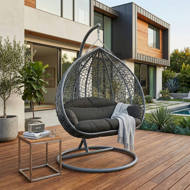 Left. LeisureMod - Recluse Teardrop Grey Wicker Hanging Egg Chair - Modern Indoor Outdoor Swing with Stand & Quick-Dry Cushion - Jet Black.