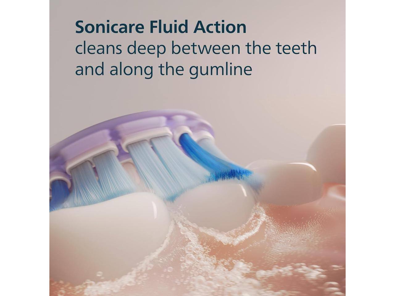 Sonicare Fluid Action cleans deep between the teeth and along the gumline.