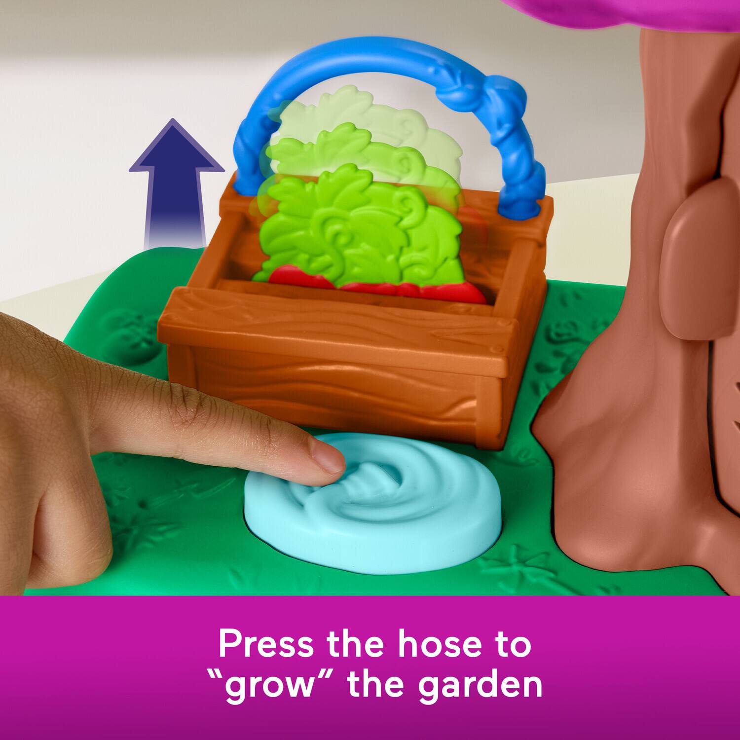 Press the hose to "grow" the garden.