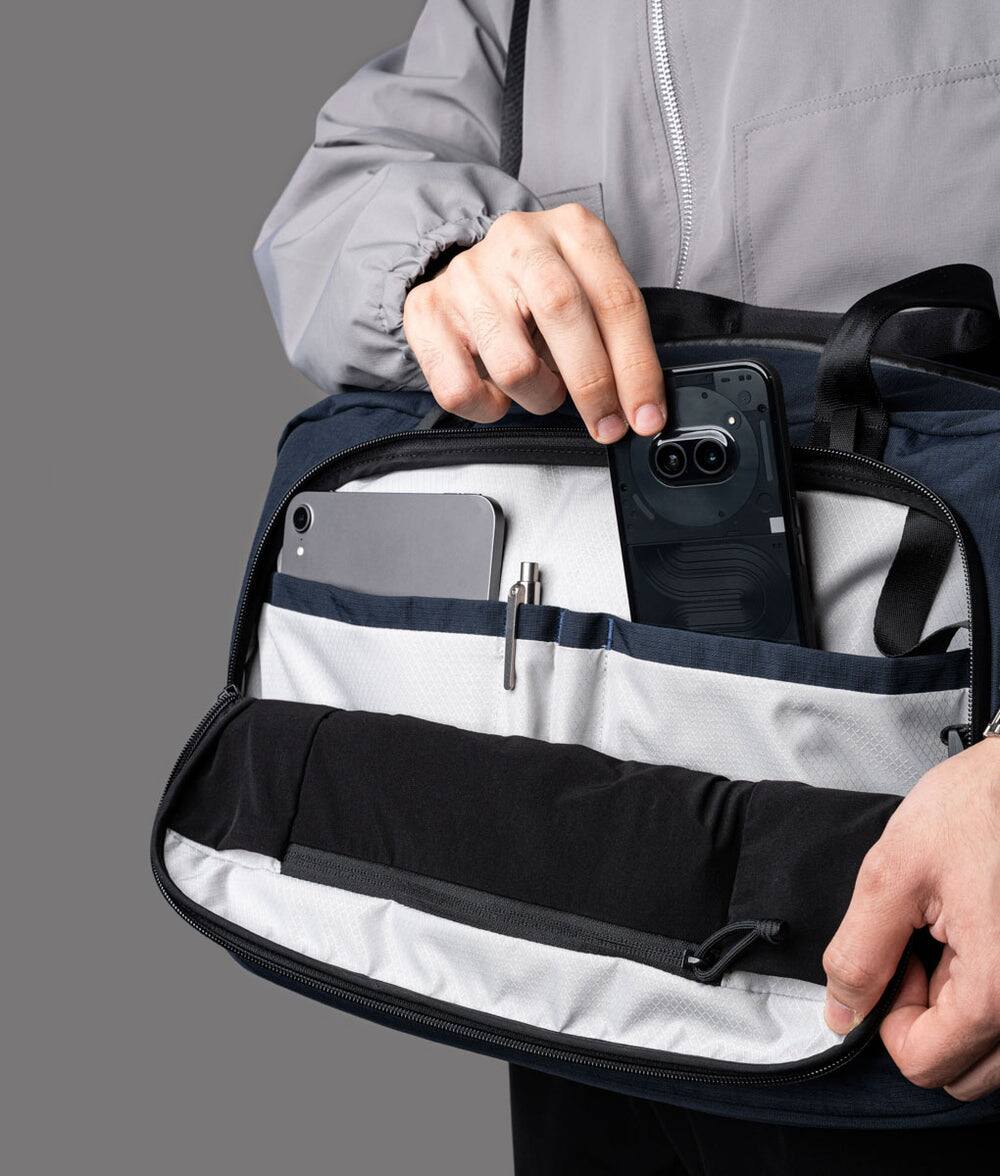 Left. ALPAKA - Bravo Brief 16 Inch Laptop Briefcase,Messenger Bag for Men and Women, Business Shoulder Bag for Work Travel - Moonlight Blue Axoflux 400D Ripstop Nylon.