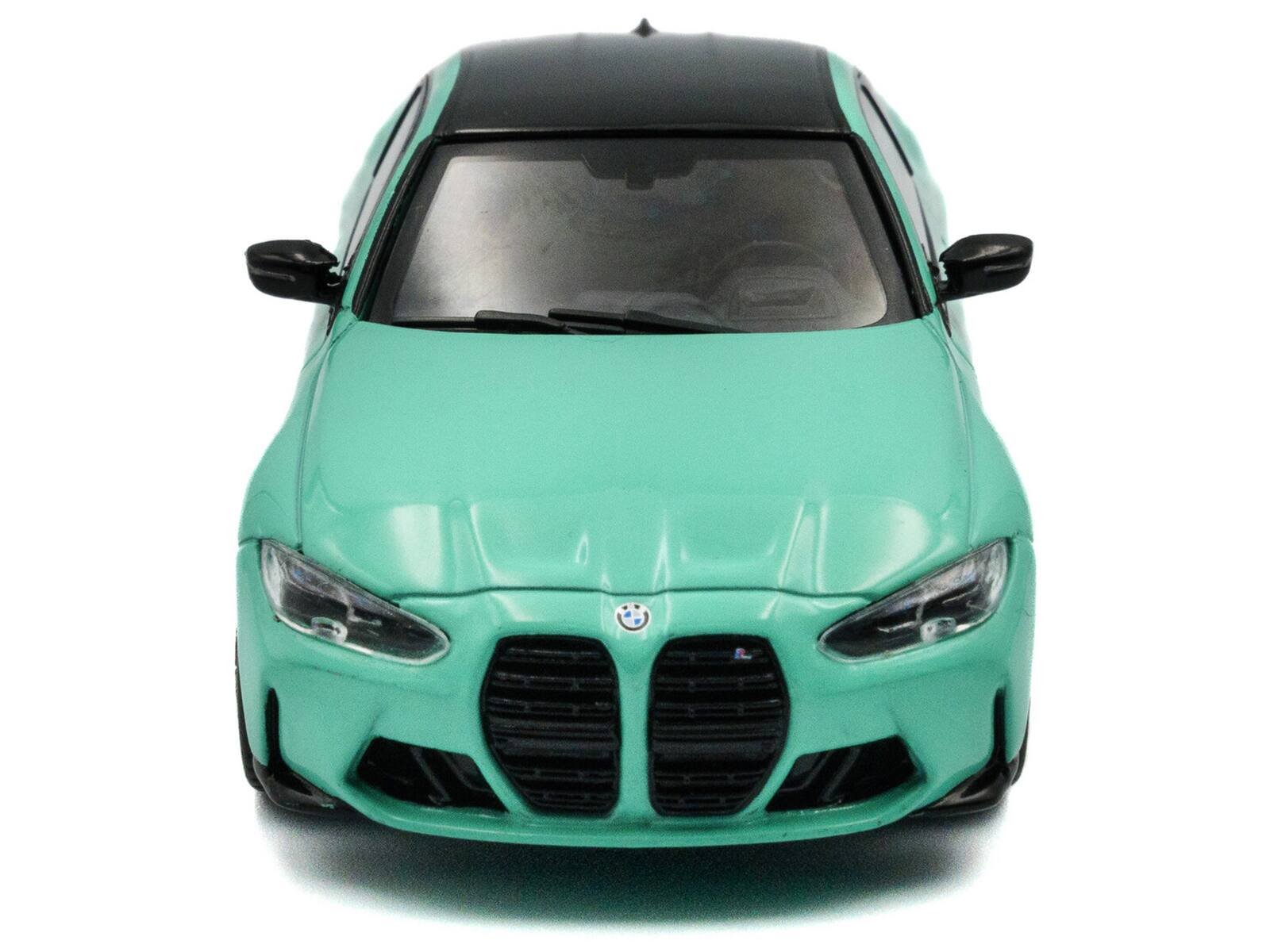 Back. Solido - 2023 BMW M4 Competition (G82) Mint Green with Black Top 1/43 Diecast Model Car by Solido - Mint Green with Black.