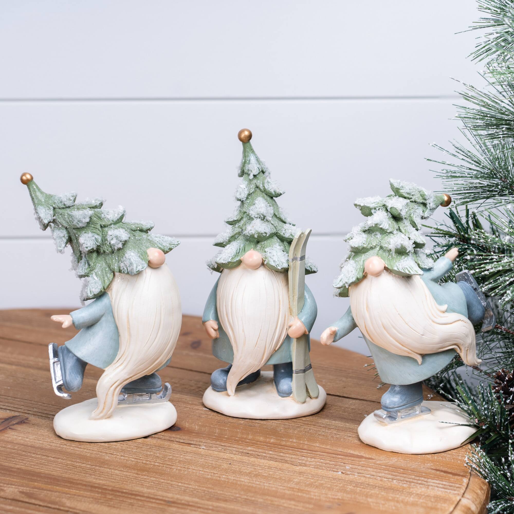 Angle. BreeBe - Pine Tree Gnome with Skis and Skates (Set of 3) - Blue , White.