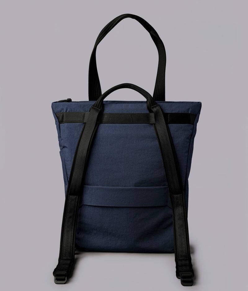 Back. ALPAKA - Flow Totepack Laptop Backpack for Men, 16" Laptop Compartment + 11" Tablet Sleeve, Tote/Backpack, Bottle Pocket - Moonlight Blue Axoflux 400D Washed Nylon.