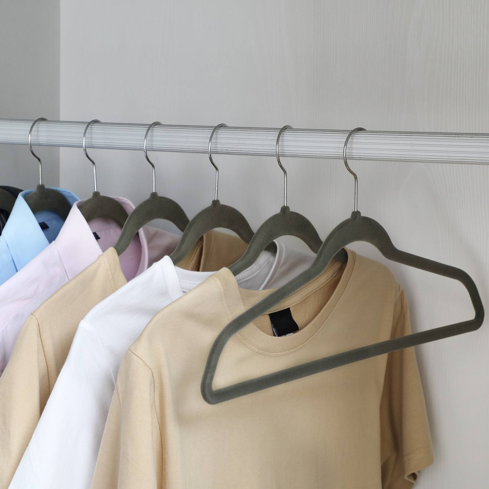 Angle. Songmics Home - Clothes Hangers, Pack of 50 Plastic Coat Hangers, Space-Saving, 0.2 Inches Thick, 17.7 Inches Wide, 360° Swivel Hook - Light Gray and Dark Gray.