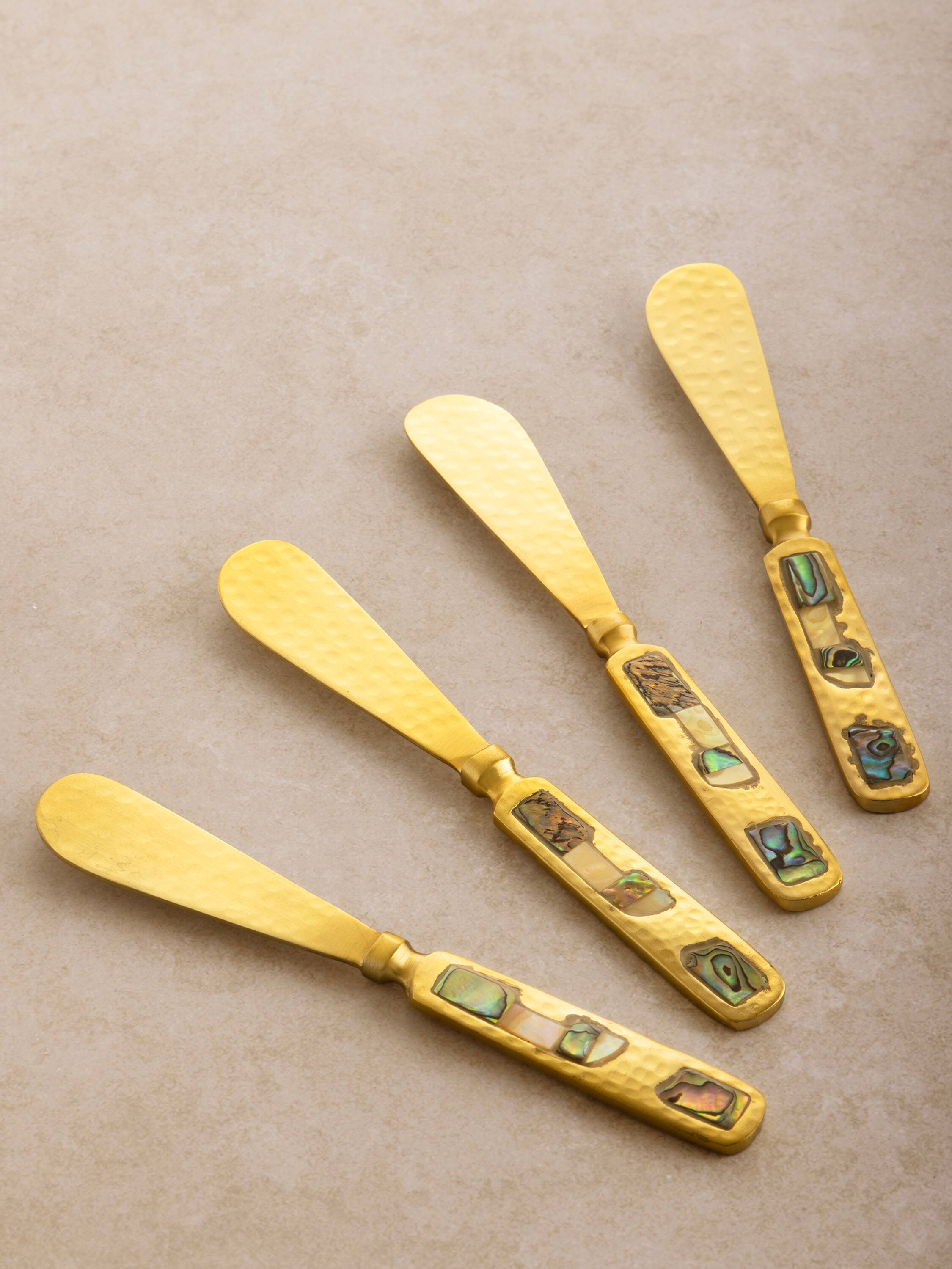 Left. GAURI KOHLI - Sisley Butter Knives - Matte gold.