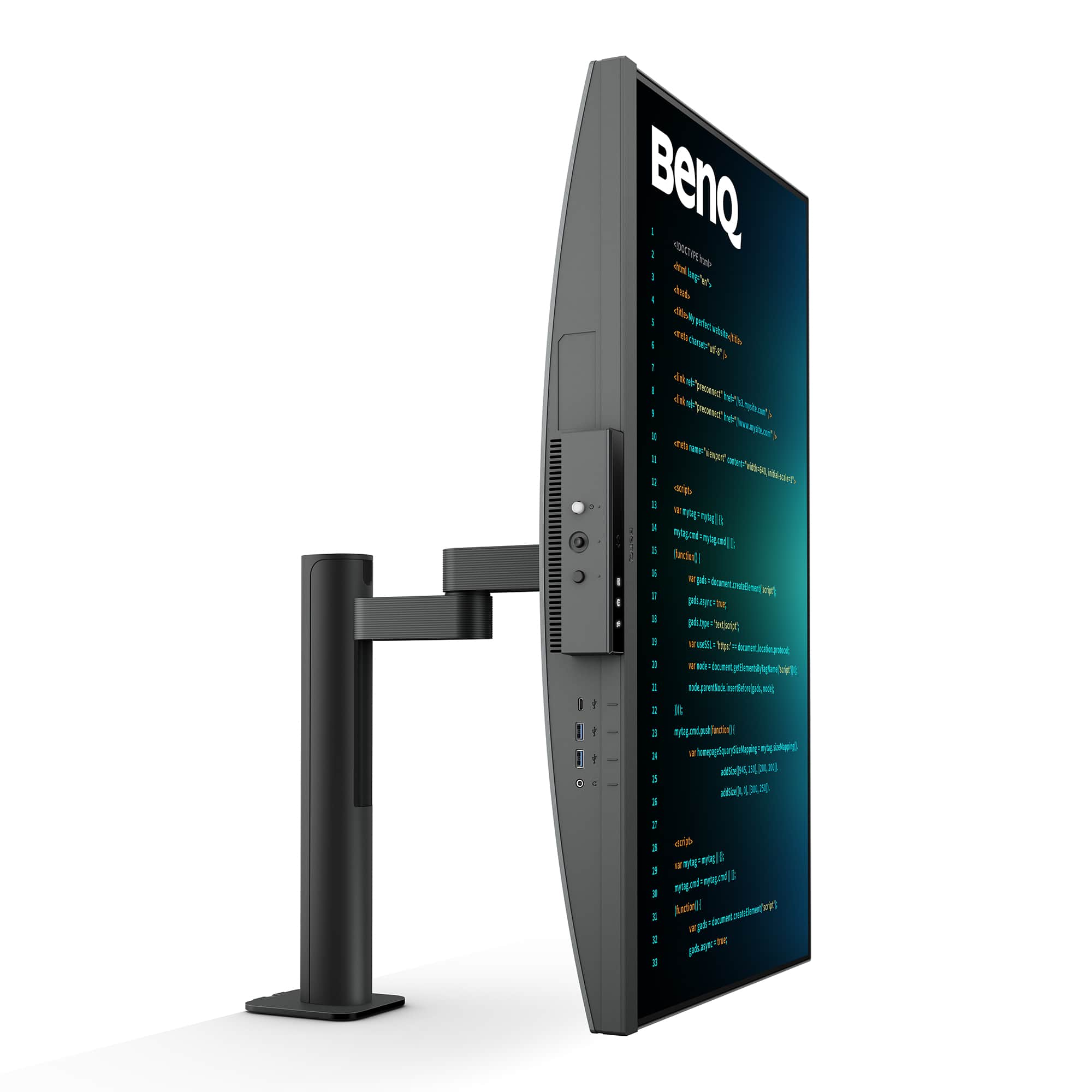 BenQ is the brand displayed on the large computer monitor.