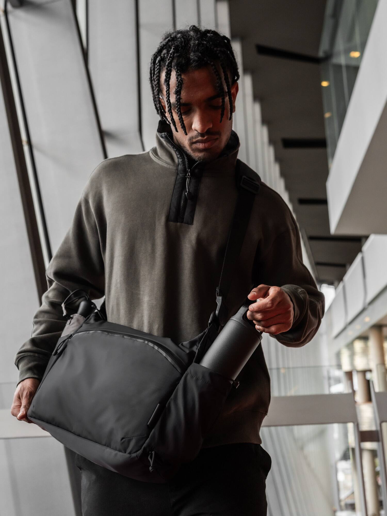 Alt View 7. ALPAKA - Laptop Messenger Satchel Bag 11L for Work & Travel, Fits 13" MacBook Air, Bottle Pockets, Luggage Pass-Through - Black Axoflux 210D.