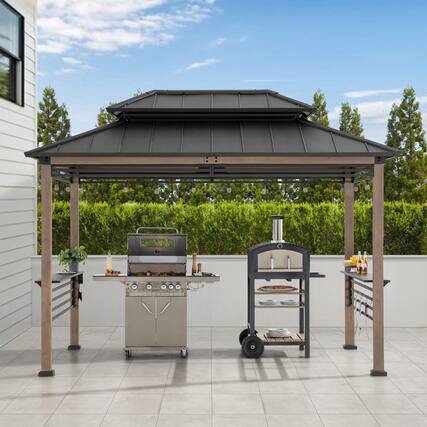 Front. SUNJOY - Sunjoy 8ft. x 12 ft. Larger Ventilated Roof Premium Cedar Framed Grill Gazebo with exclusive AC Power Port - Aspen Cedar+AC Power Port+Brown.