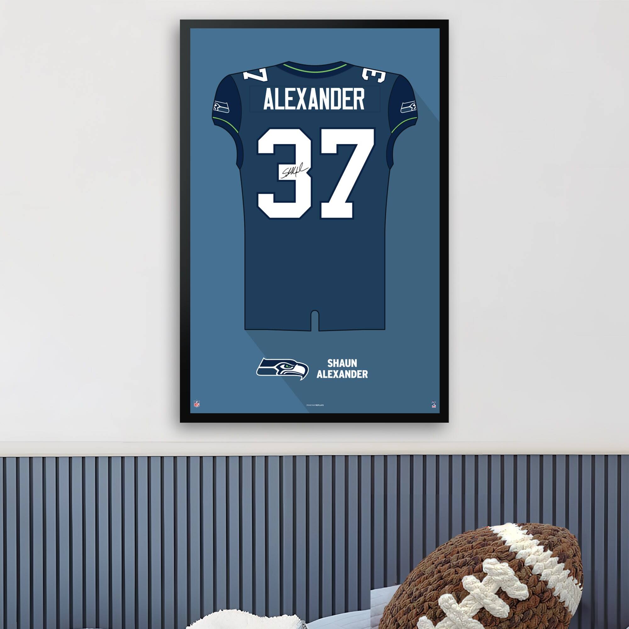 E ALEXANDER 37 su SHAUN Y ALEXANDER a

Corrected text:
E ALEXANDER 37 su SHAUN ALEXANDER a
