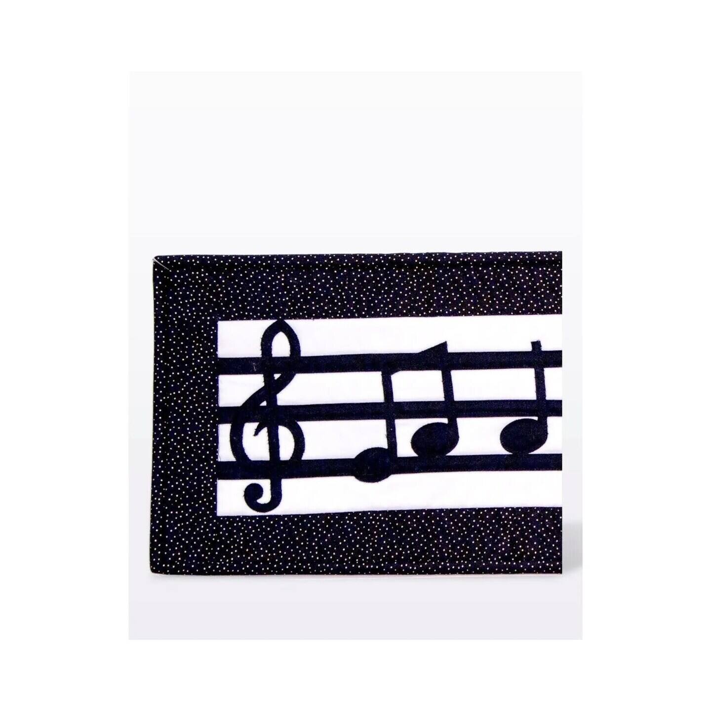 Left. AccuQuilt - GO! Music Medley Die - Multicolor.