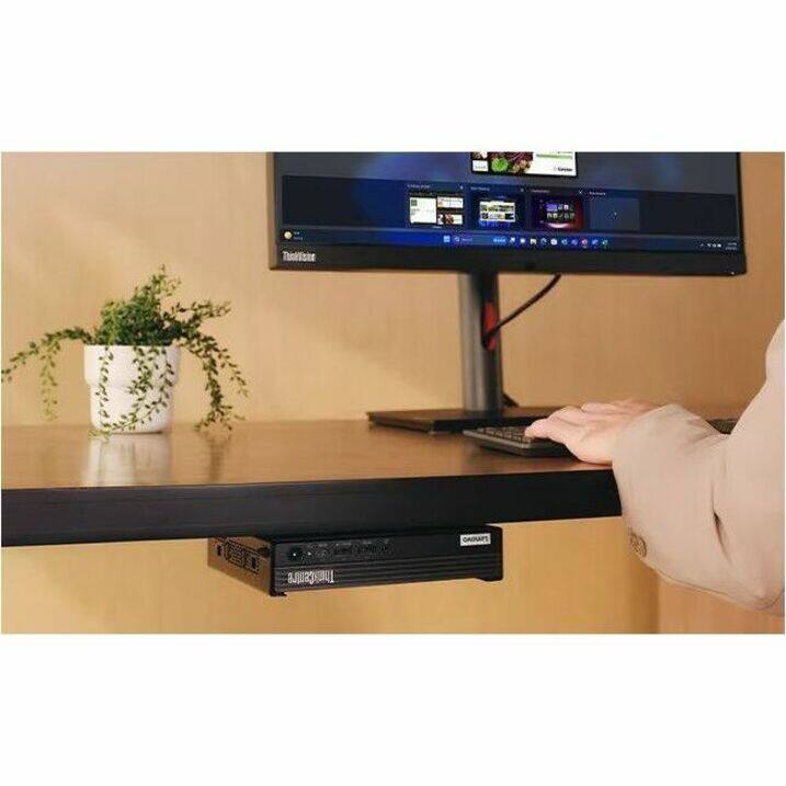 The image shows a setup with the following text:

1. On the TV screen:
   - "TheVine"

2. On the devices below the TV:
   - "TRENDnet"
   - "GADGET"