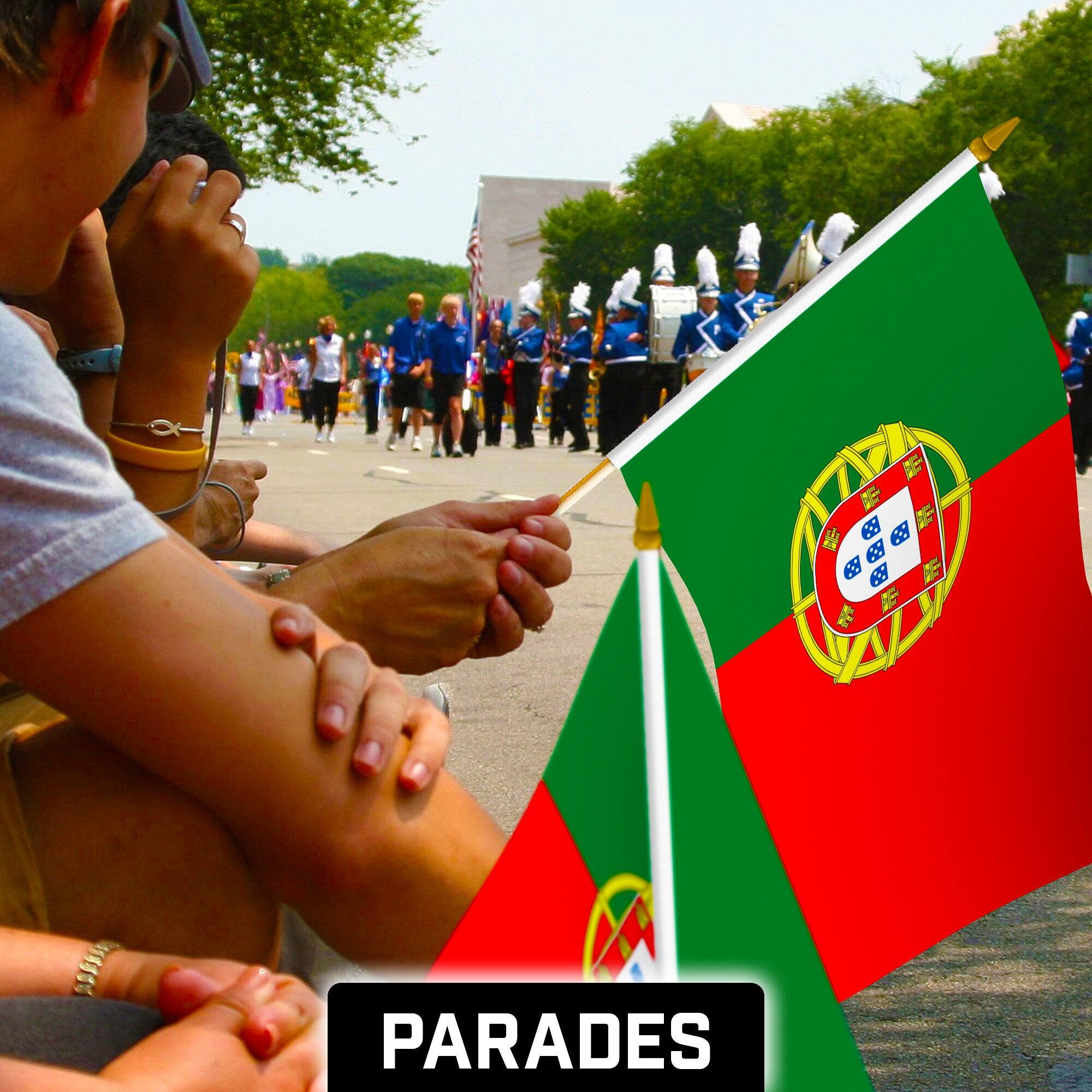 Alt View 1. G128 - 12 Pack Handheld Portugal Stick Flags, 12 x 18 in, 150D Polyester with Wooden Poles and Gold Spear Tips. - Assorted Colors.