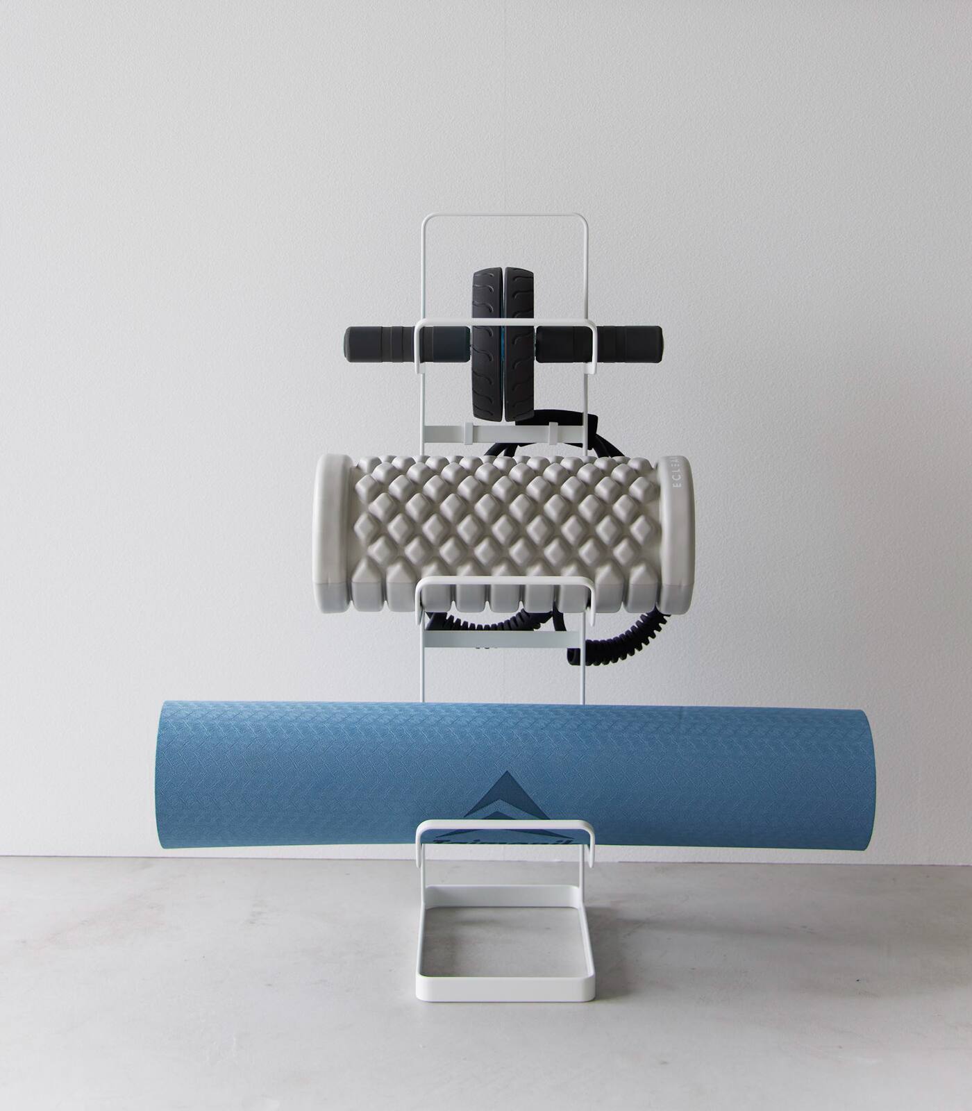 Angle. Yamazaki Home - Fitness Equipment Storage Rack - White.