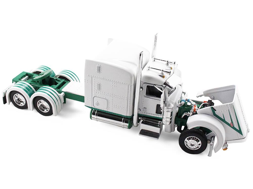 Alt View 2. First Gear - Peterbilt 389 with 63" Mid-Roof Sleeper and 53' Utility Trailer White with Green Stripes 1/64 Model by DCP/First Gear.