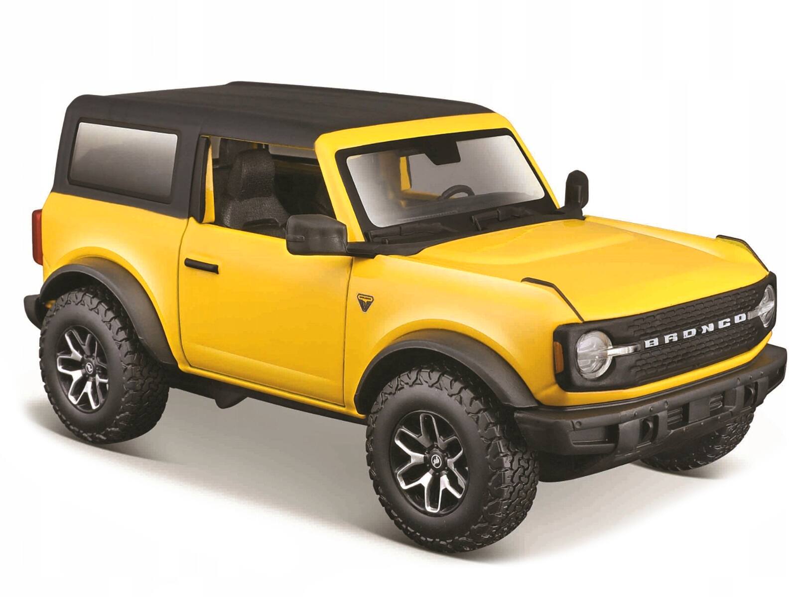 Angle. Maisto - 2021 Ford Bronco Badlands Yellow with Black Top "Special Edition" 1/24 Diecast Model Car by Maisto - Yellow With Black.