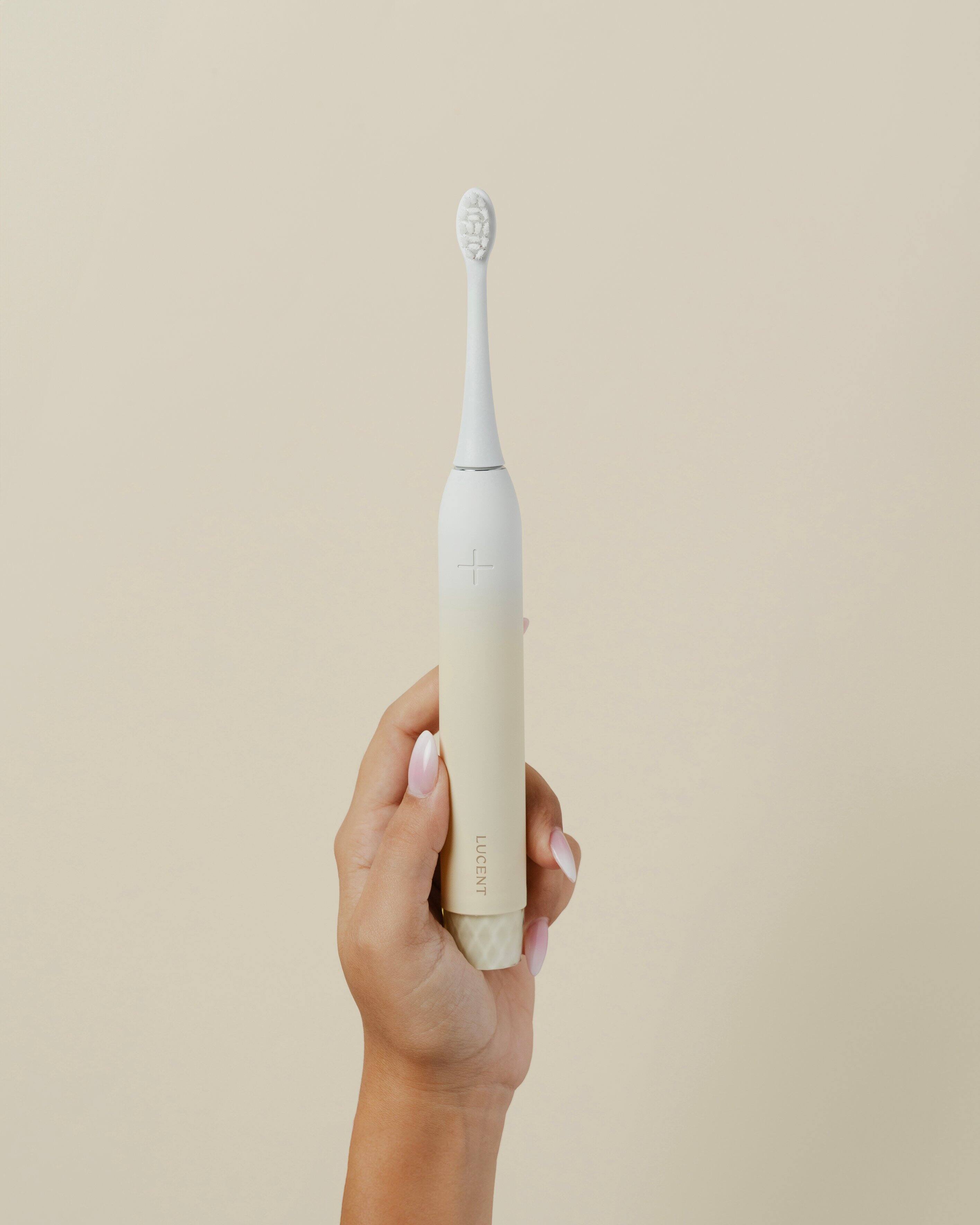 Angle. Be Lucent - Sonic Electric Toothbrush - Vanilla Cream.