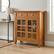 Front. Simpli Home - Acadian Solid Wood 36 inch Wide Transitional Entryway Hallway Storage Cabinet - Light Golden Brown.