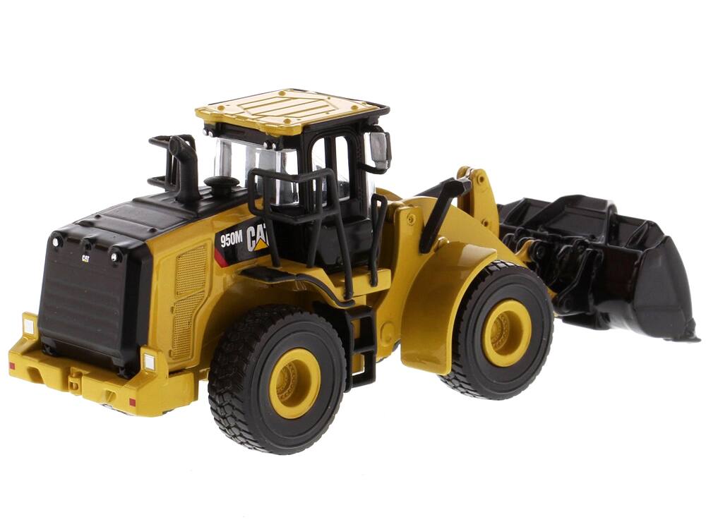 Left. Diecast Masters - CAT Caterpillar 950M Wheel Loader "Play & Collect!" Series 1/64 Diecast Model by Diecast Masters - Yellow.