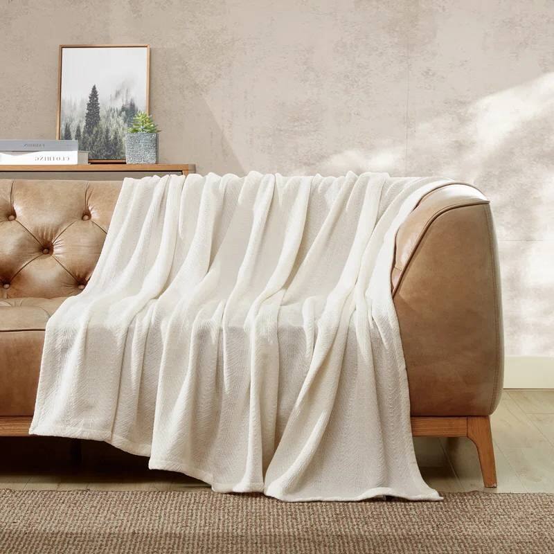 Angle. Hivvago - King size Cream Bone Lightweight 100-Percent Cotton Blanket - Machine Washable - Cream.