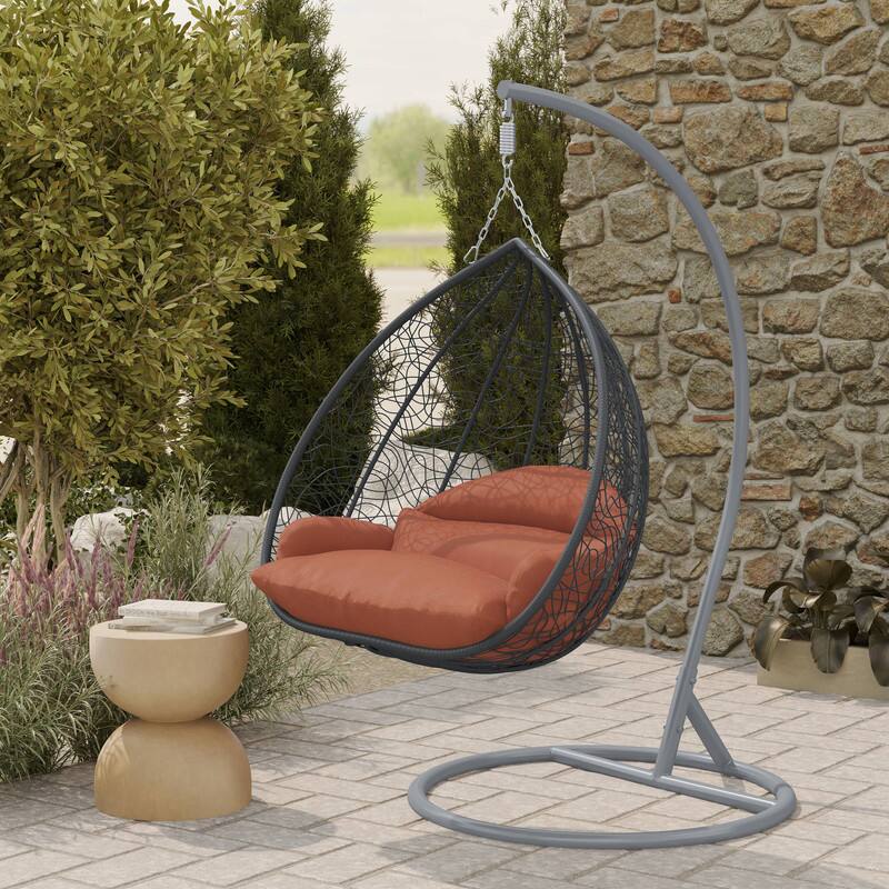 Left. LeisureMod - Recluse Grey Wicker Hanging Egg Chair - Modern Indoor Outdoor Swing with Stand, 440lb Capacity - Orange.