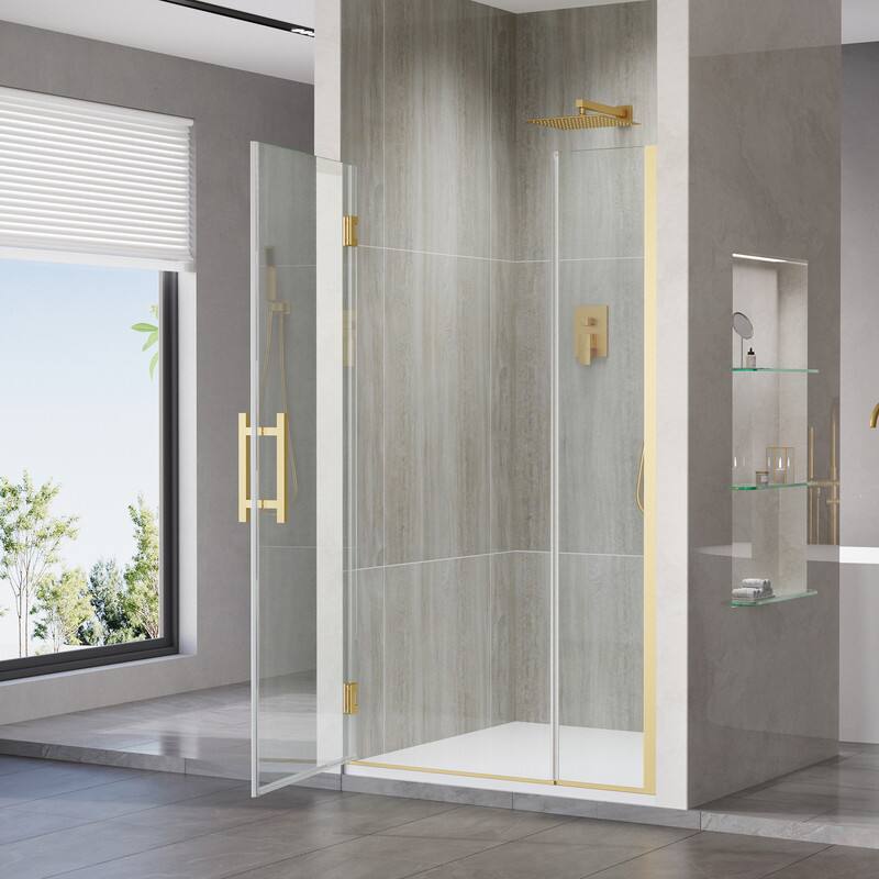 Left. WELLFOR - 41–42 in. W x 72 in. H Frameless Hinged Shower Door with 3/8" Clear Tempered Glass, Reversible Opening - Brushed Gold.