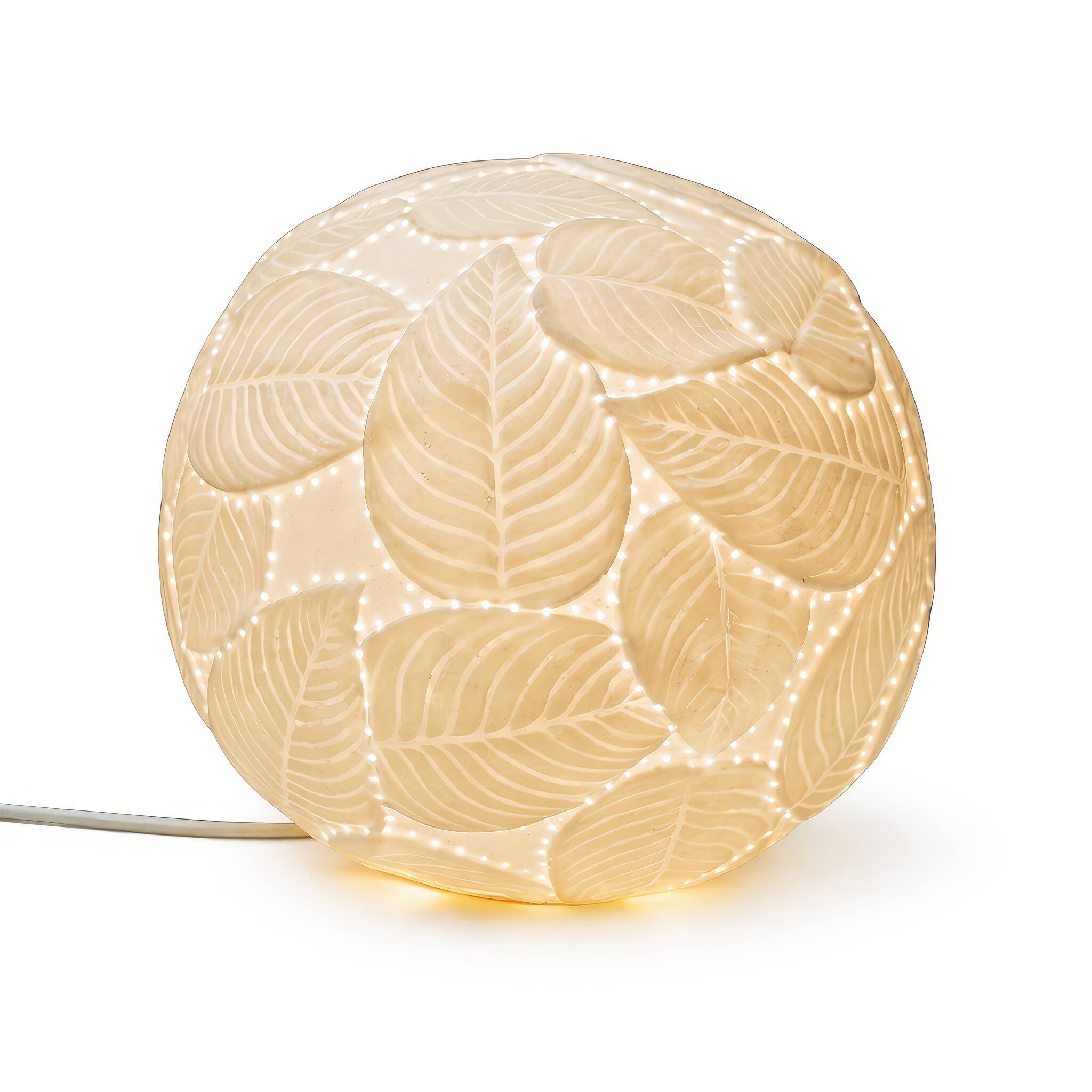 Angle. FC Design - 7"H Golden Sphere w/ Embossed Leaf Glow Design Table Lamp.