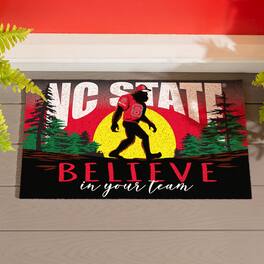 Evergreen Enterprises - NC State Wolfpack 28" x 16" Bigfoot Believe in Your Team Turf Door Mat - Multicolor