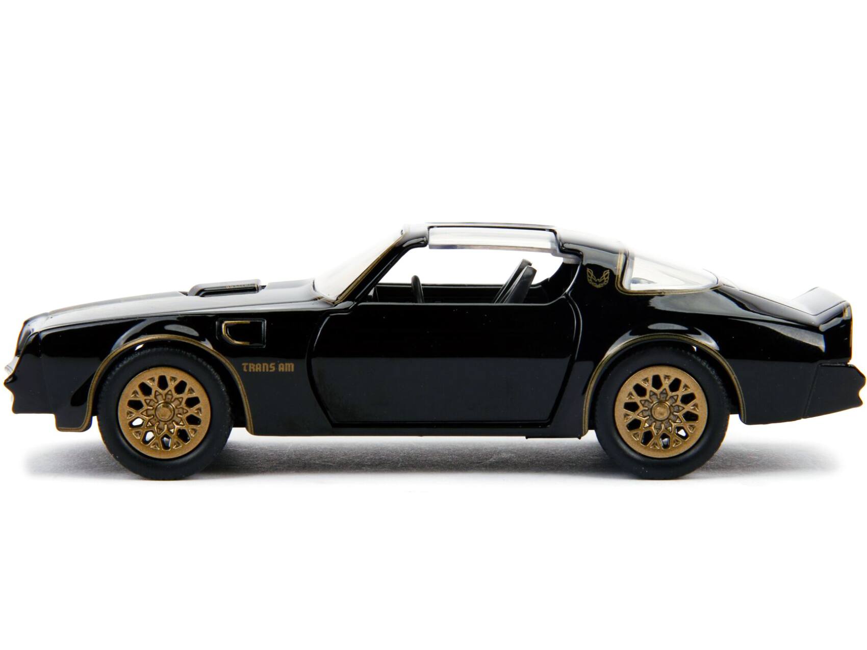 Angle. Jada - 1977 Pontiac Firebird Black "Smokey and the Bandit" (1977) Movie "Hollywood Rides" Series 1/32 Diecast Model Car by Jada - Black, Gold.