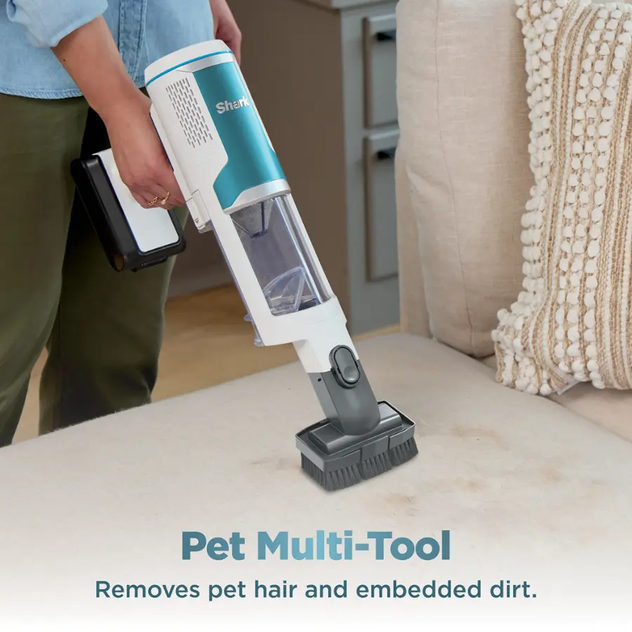 The text on the image reads, "Pet Multi-Tool Removes pet hair and embedded dirt."