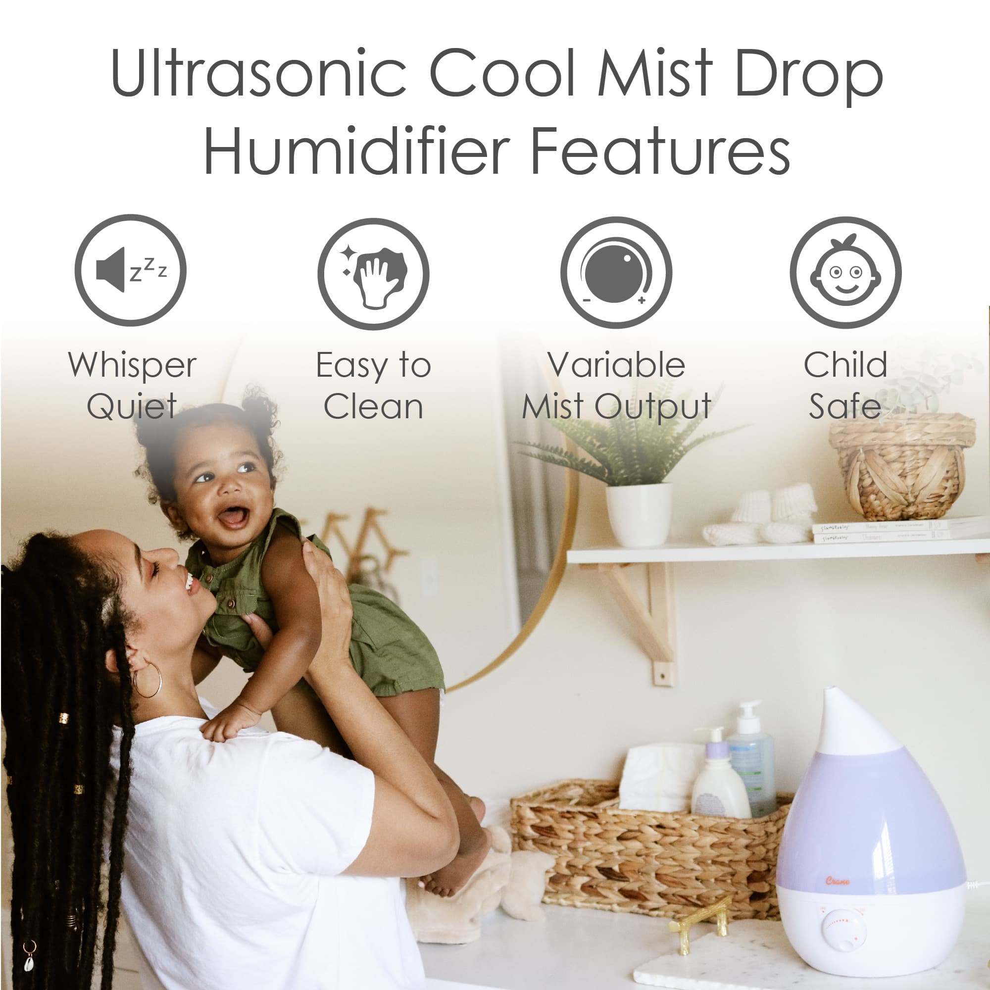 The image features a woman holding a child in a kitchen setting. The woman is wearing a white shirt and has a potted plant nearby. The child is smiling and appears to be enjoying the moment. The scene is accompanied by a description of the humidifier's features, which include whisper quiet operation, easy-to-clean functionality, variable mist output, and child safety. The humidifier is designed to provide cool mist, making it an ideal choice for maintaining a comfortable and healthy indoor environment.