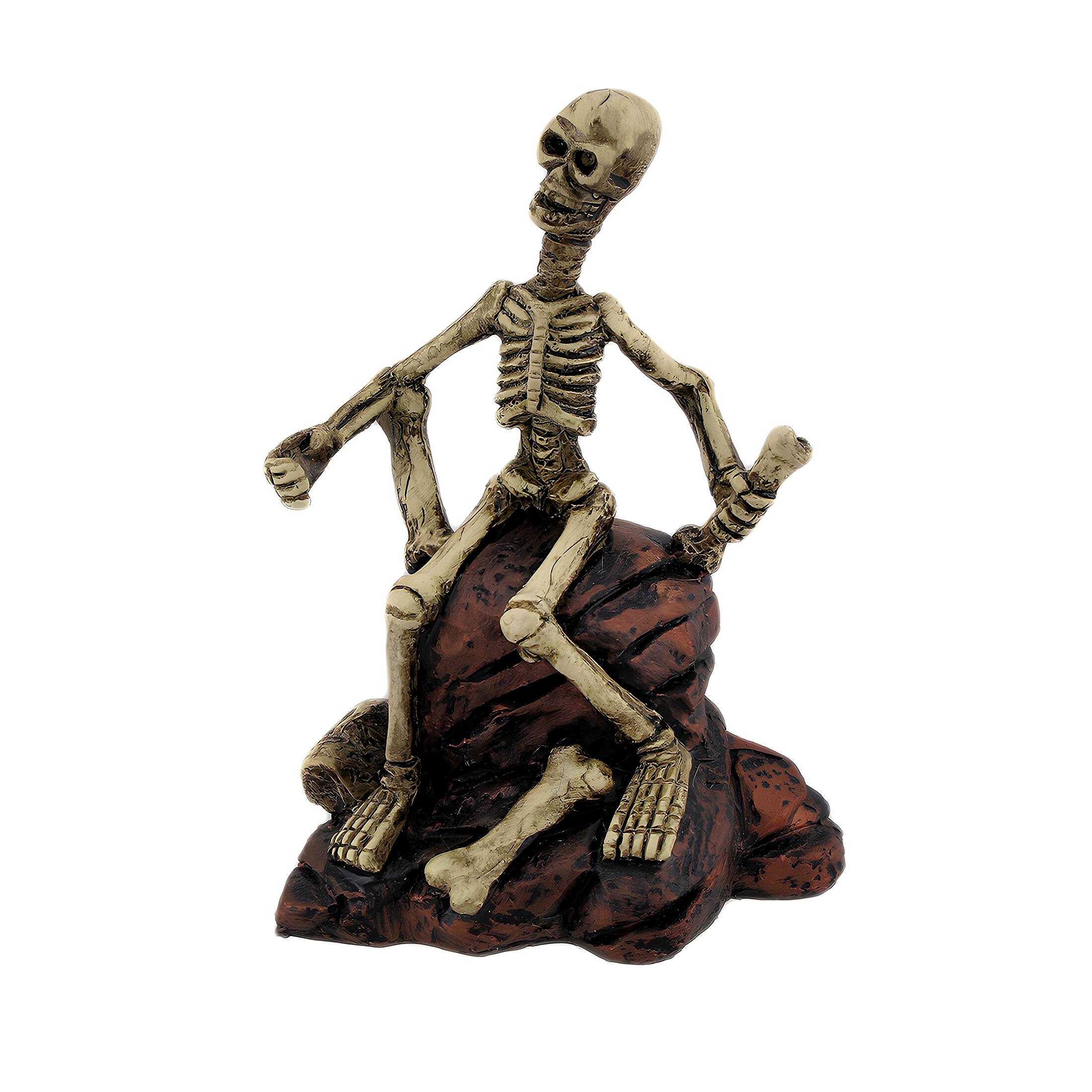 Front. Zeckos - Creepy Skeleton Sitting On Rocks Statue Figure - Multicolored.