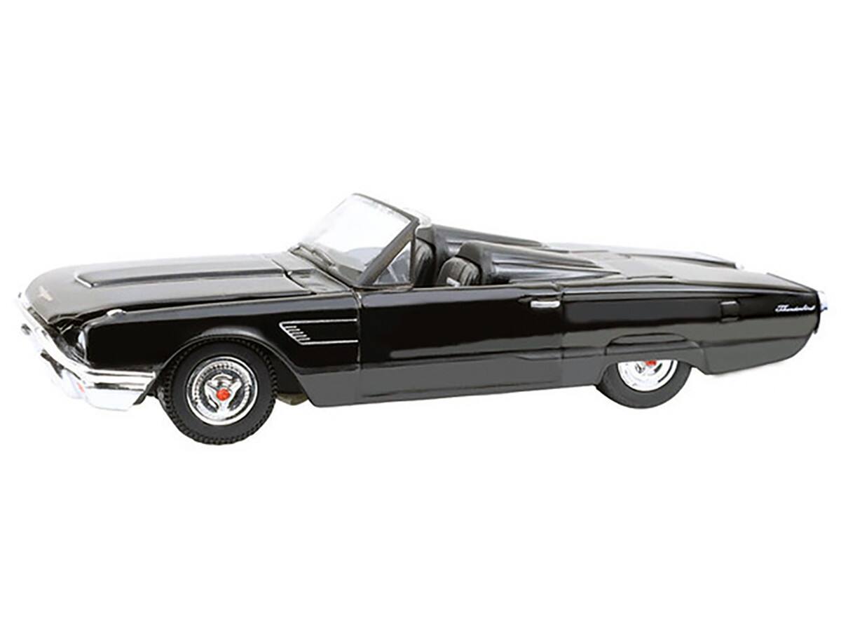 Left. Greenlight - 1965 Ford Thunderbird with Tonneau Cover Black "Black Bandit" Series 30 1/64 Diecast Model Car by Greenlight - Black.