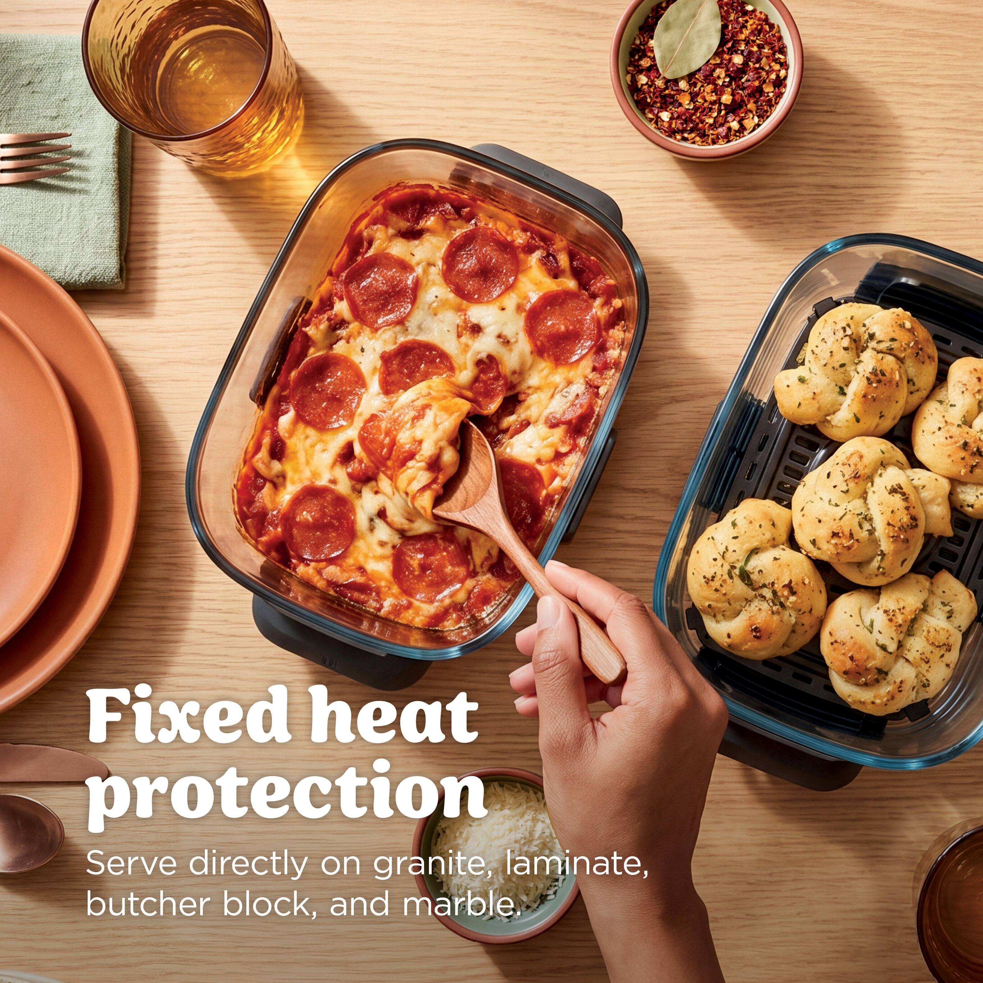 Fixed heat protection  
Serve directly on granite, laminate, butcher block, and marble.