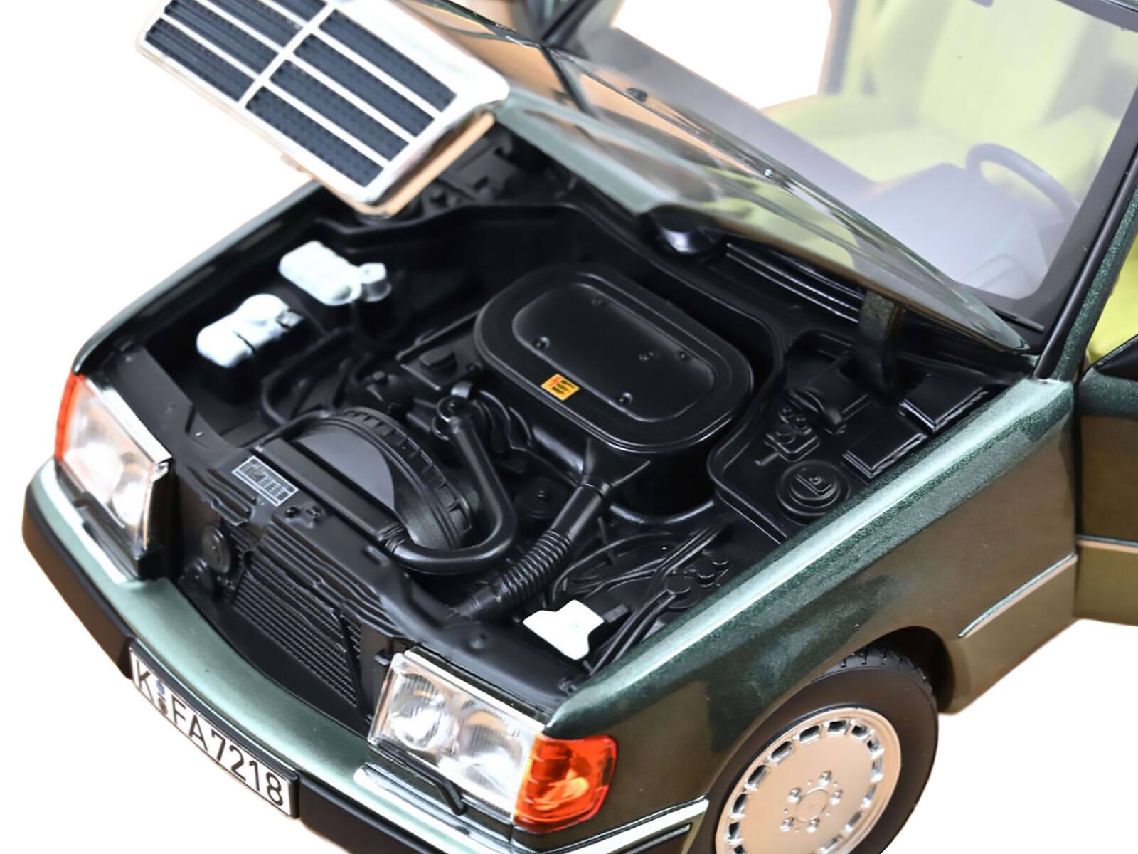 Alt View 2. Norev - 1990 Mercedes-Benz 230 E Night Green Metallic with Green Interior 1/18 Diecast Model by Norev.