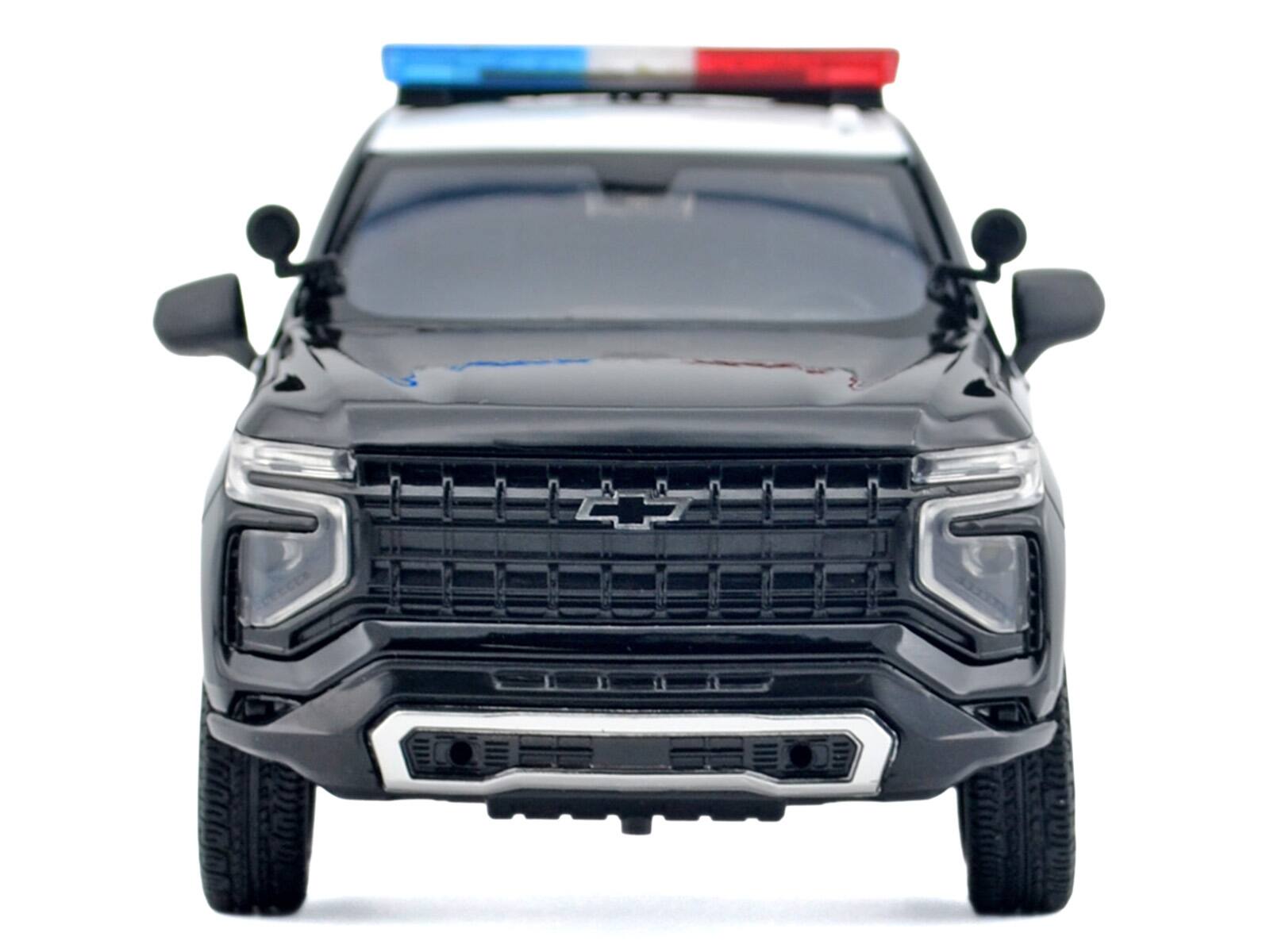 Alt View 2. Motormax - 2025 Chevrolet Tahoe PPV "LAPD" Black and White with Light Bar and Lights and Sounds 1/24 Diecast Model Car by Motormax.