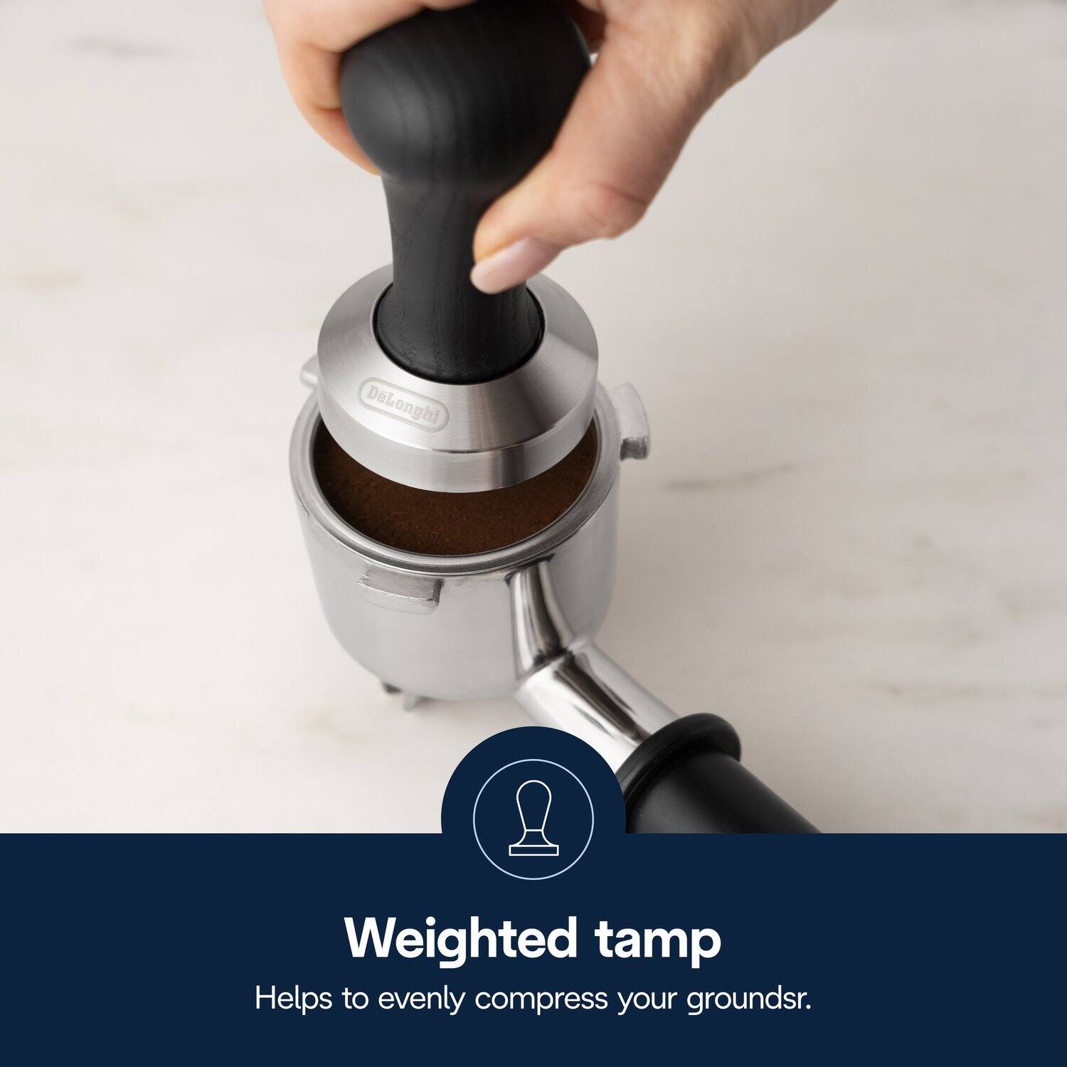 DeLonghi Weighted tamp Helps to evenly compress your grounds.