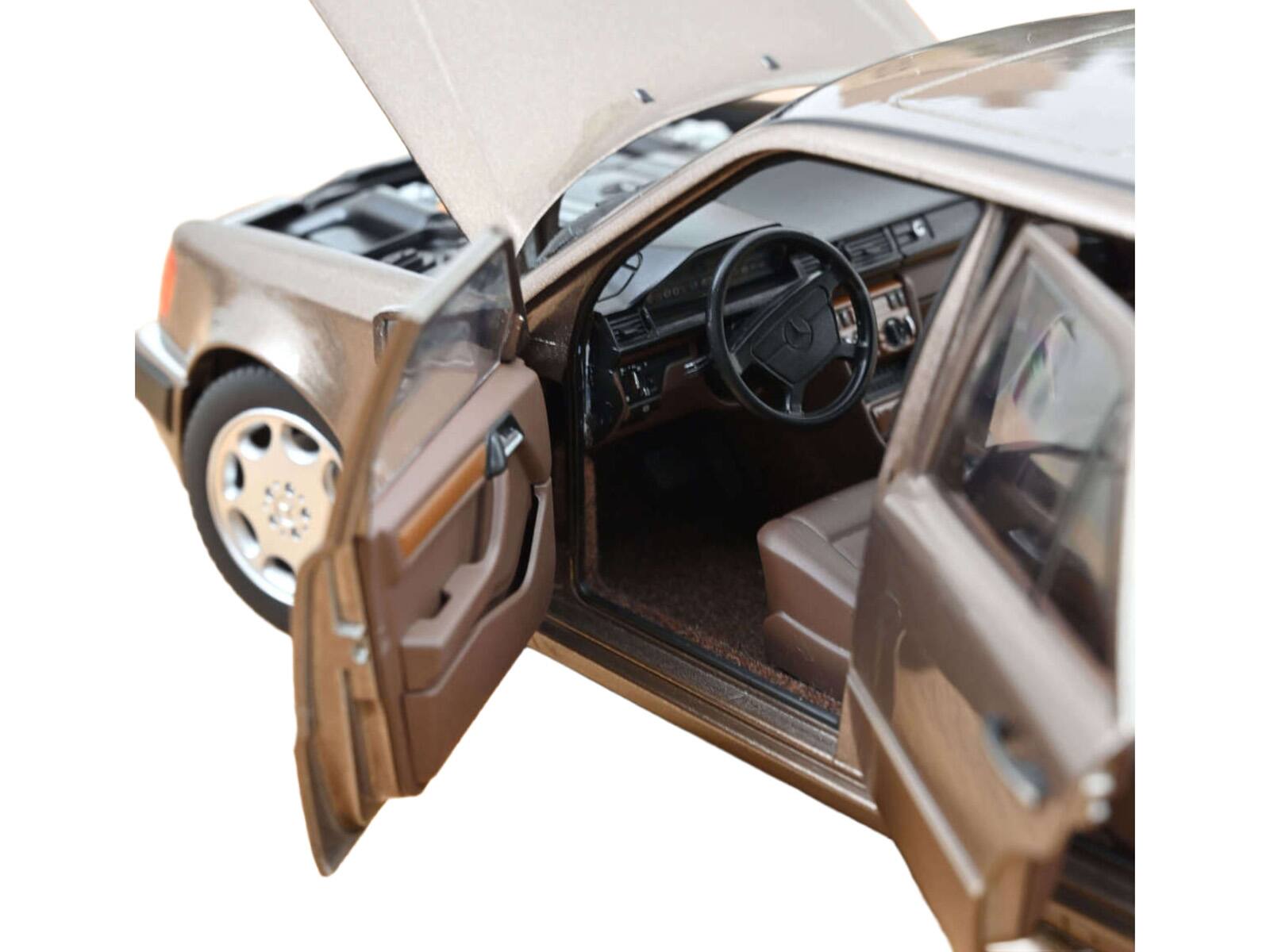 Alt View 3. Norev - 1990 Mercedes-Benz 500 E Impala Brown Metallic 1/18 Diecast Model by Norev.