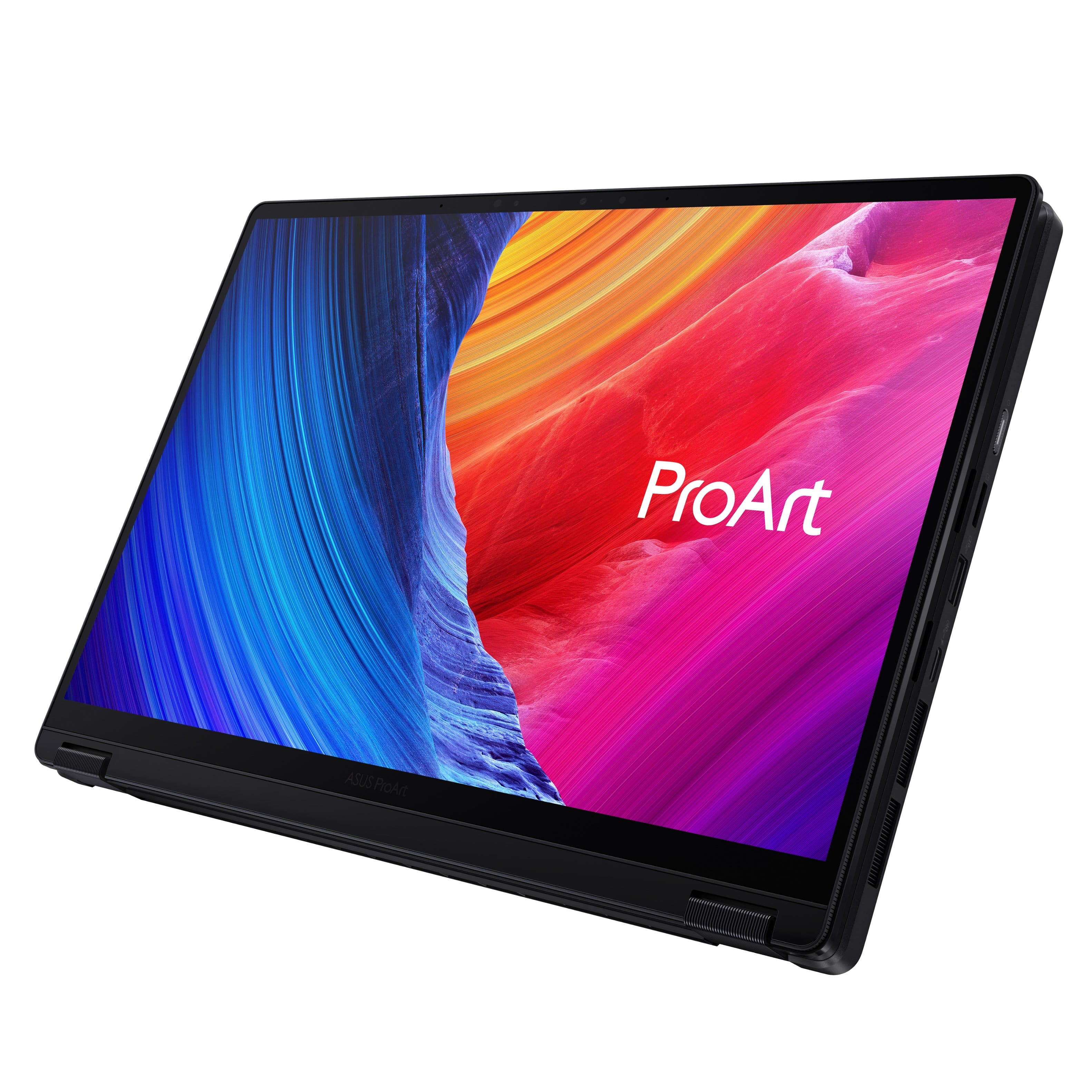 The image features a laptop computer with a vibrant, colorful background. The laptop screen displays the word "ProArt" in large text, indicating that it is an ASUS ProArt laptop. The laptop is positioned in a way that showcases its screen, making it the main focus of the image.