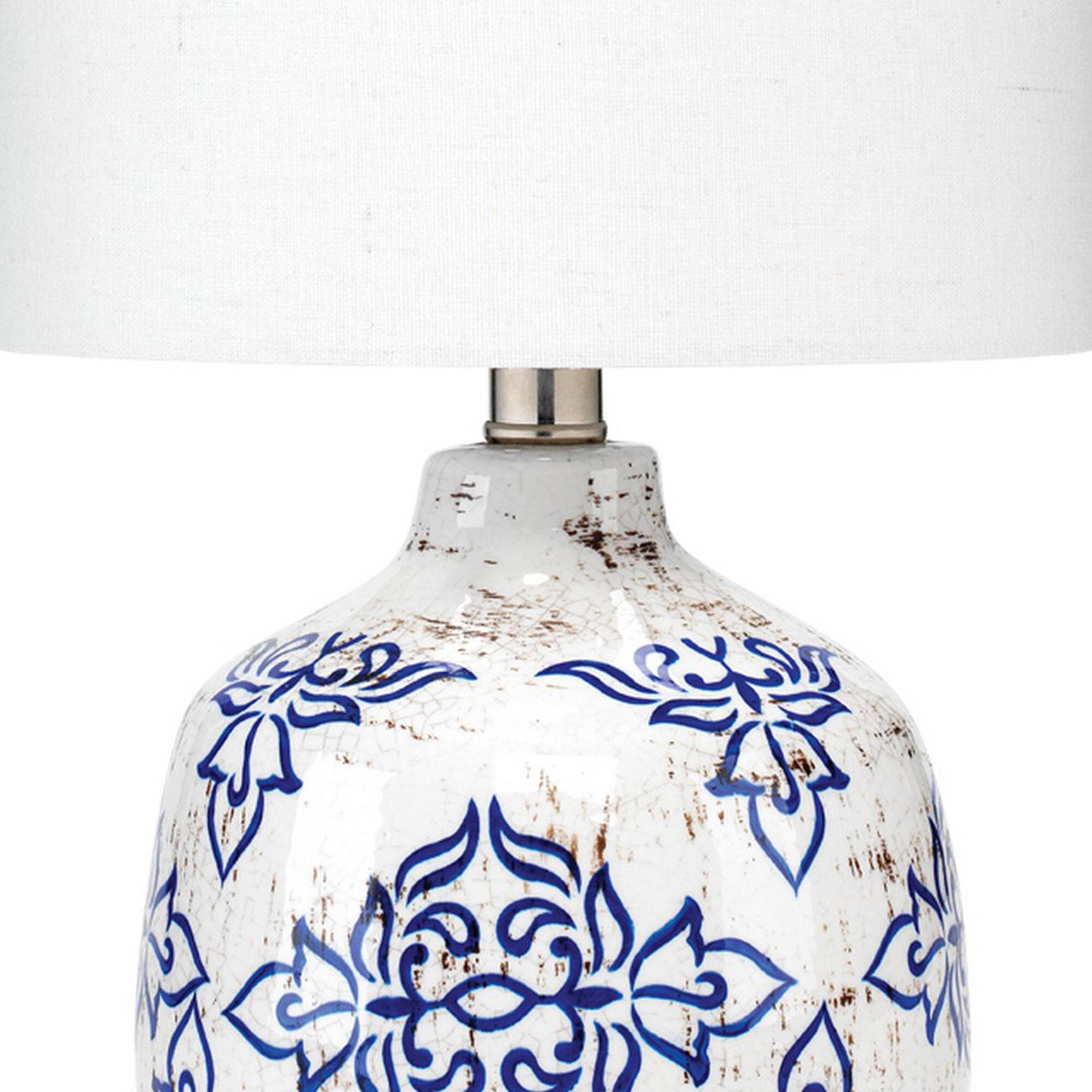 Left. Manhattan Lane - Table Lamp with Floral Pattern Ceramic Base - White.