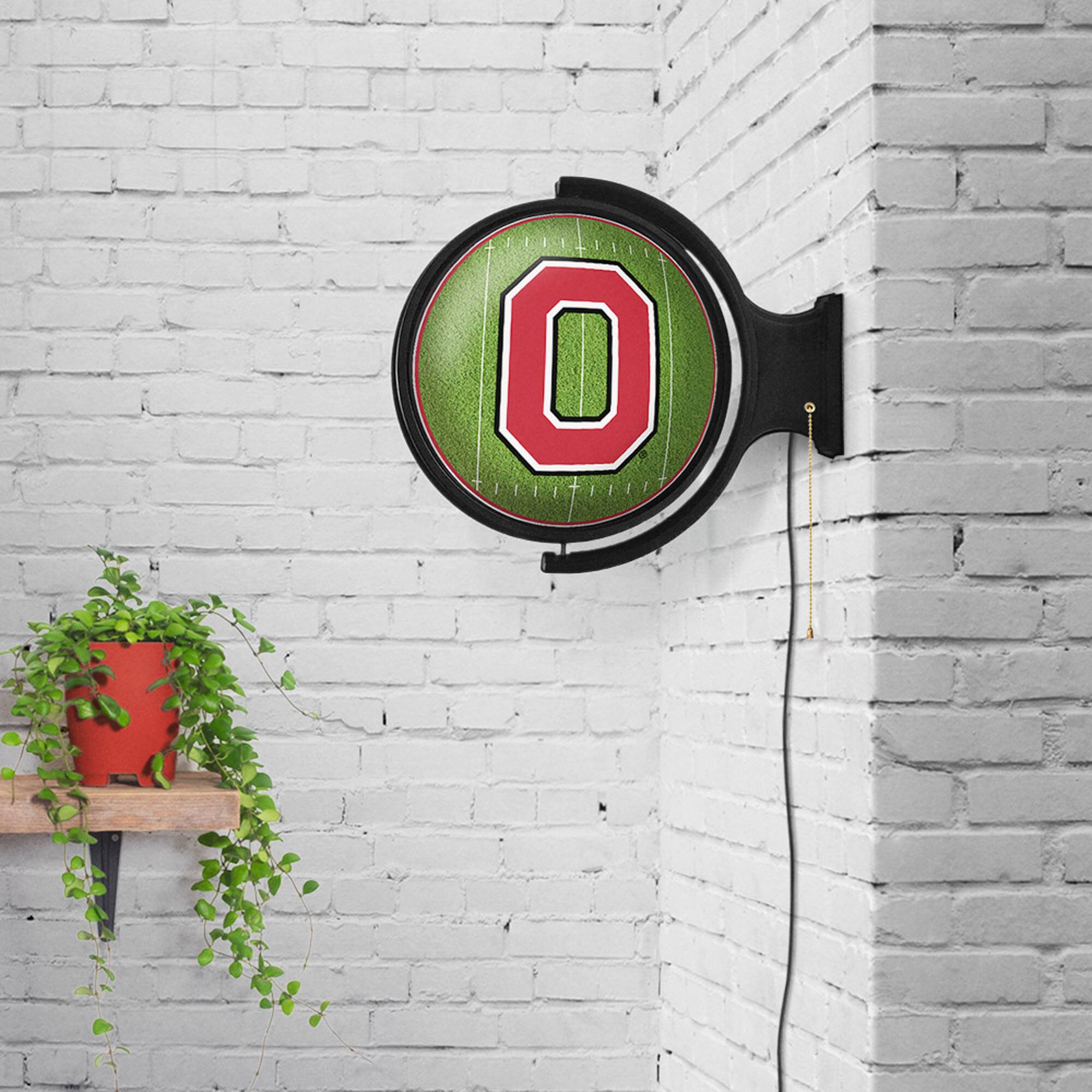 Alt View 2. The Fan-Brand - Ohio State Buckeyes Football 21'' x 23'' Rotating Lighted Wall Sign - Multicolor.