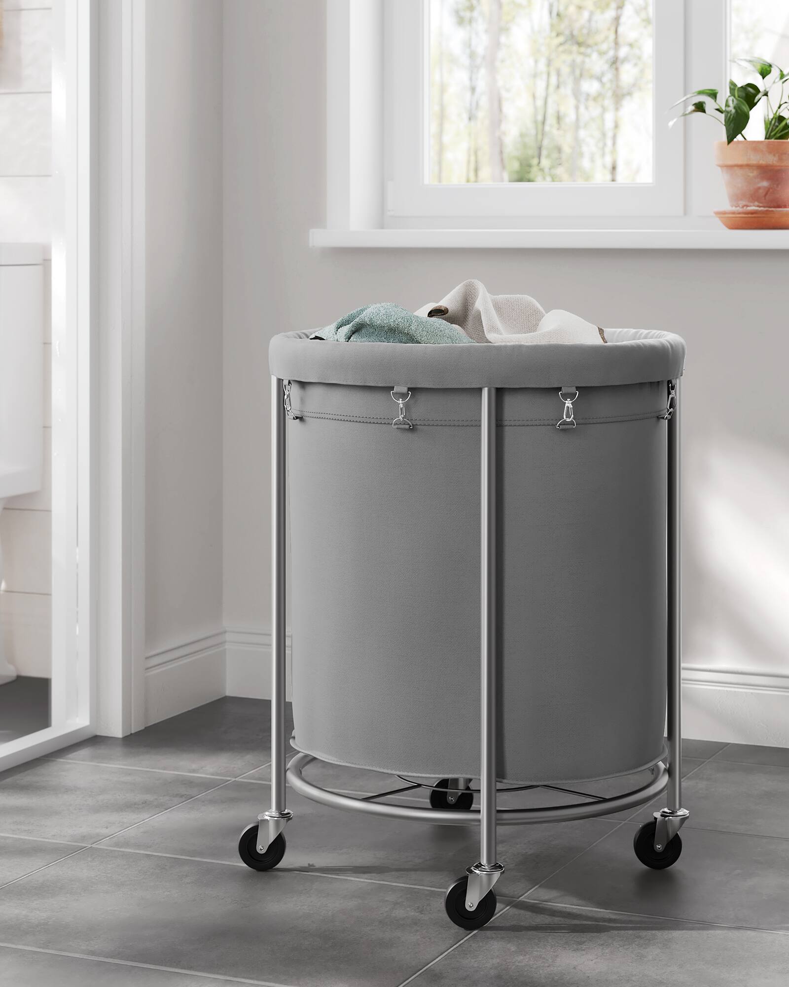 Alt View 5. Songmics Home - 50.2-Gallon (190 L) Laundry Basket with Wheels, Rolling Round Heavy-Duty Laundry Hamper Cart,Steel Frame,Removable Bag - Gray and Metallic Silver.