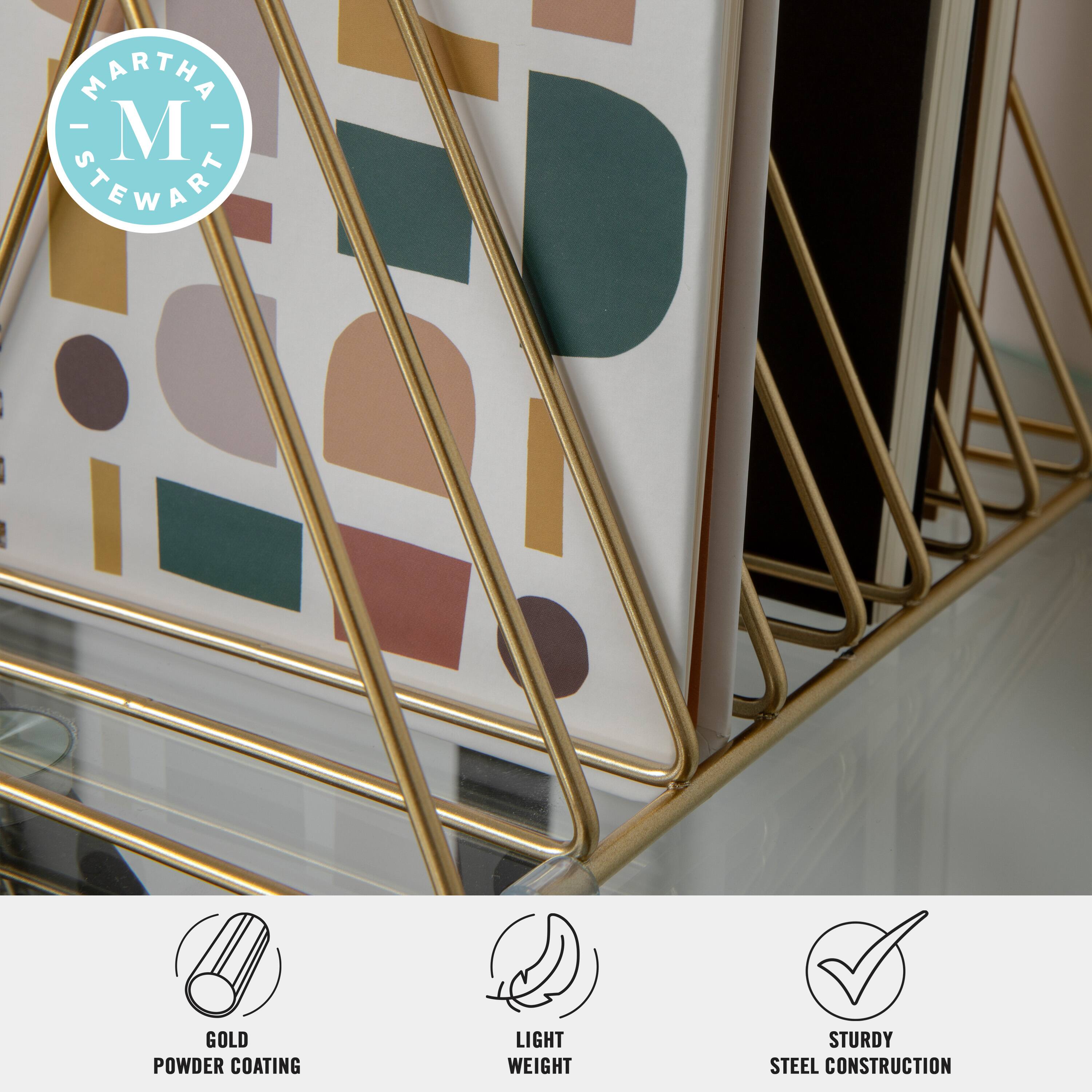 Martha Stewart is the brand associated with the gold powder coating, which is applied to the lightweight and sturdy steel construction.