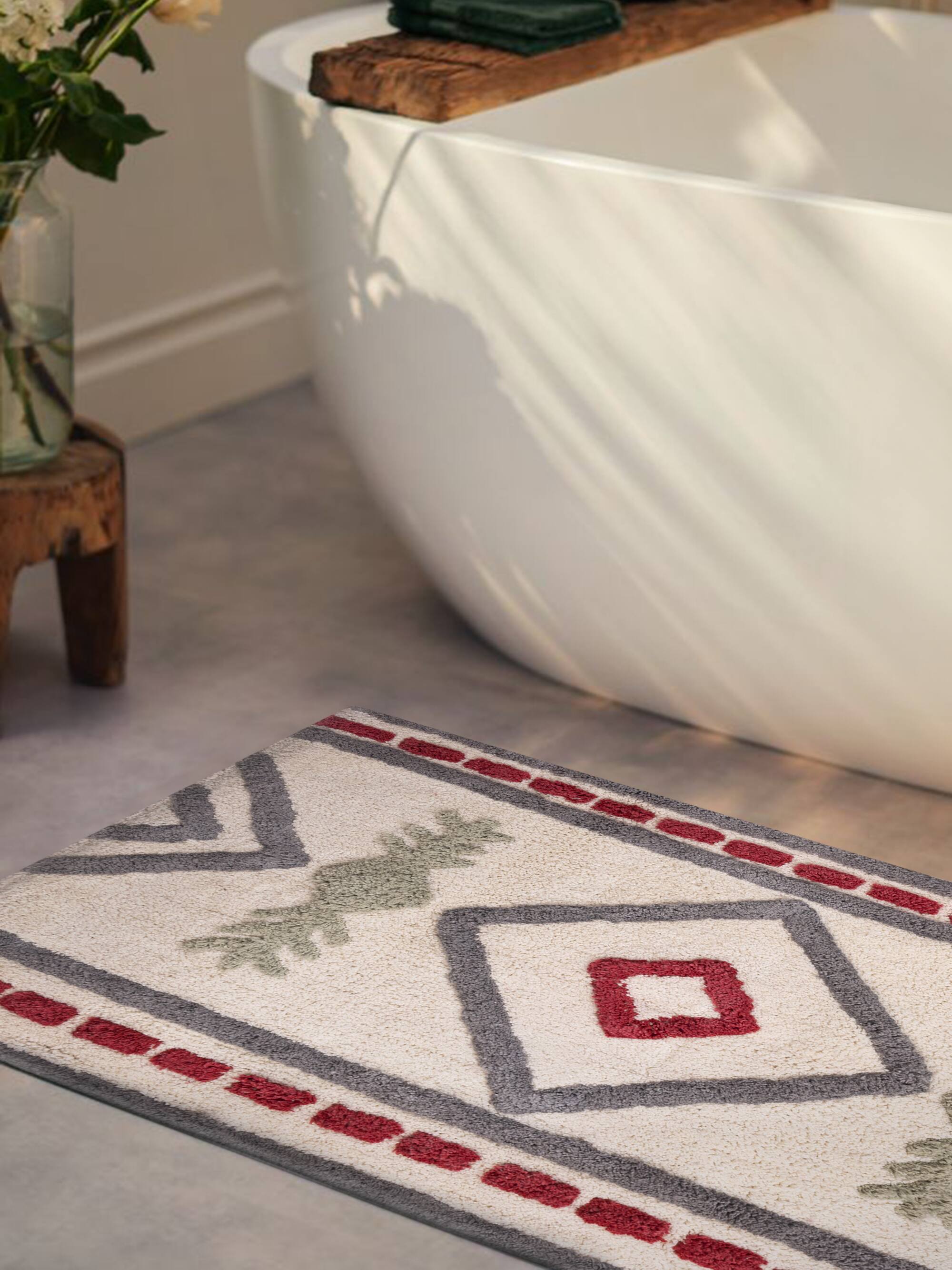 Left. GAURI KOHLI - Gohana Bath Mat - Multicolored.