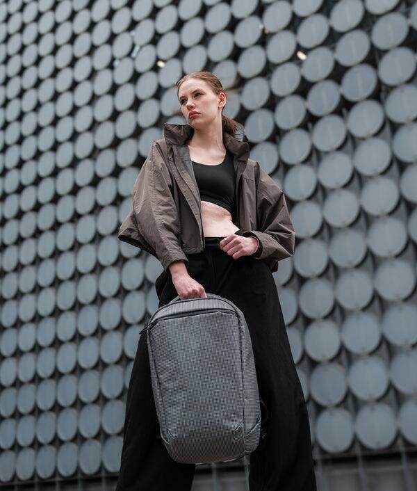 Alt View 10. ALPAKA - Lightweight 22L Laptop Backpack for 16-inch Laptop, Momentum Backpack for Work, Travel & Commuting, Weather-Resistant - Axodyne hybrid Grey.