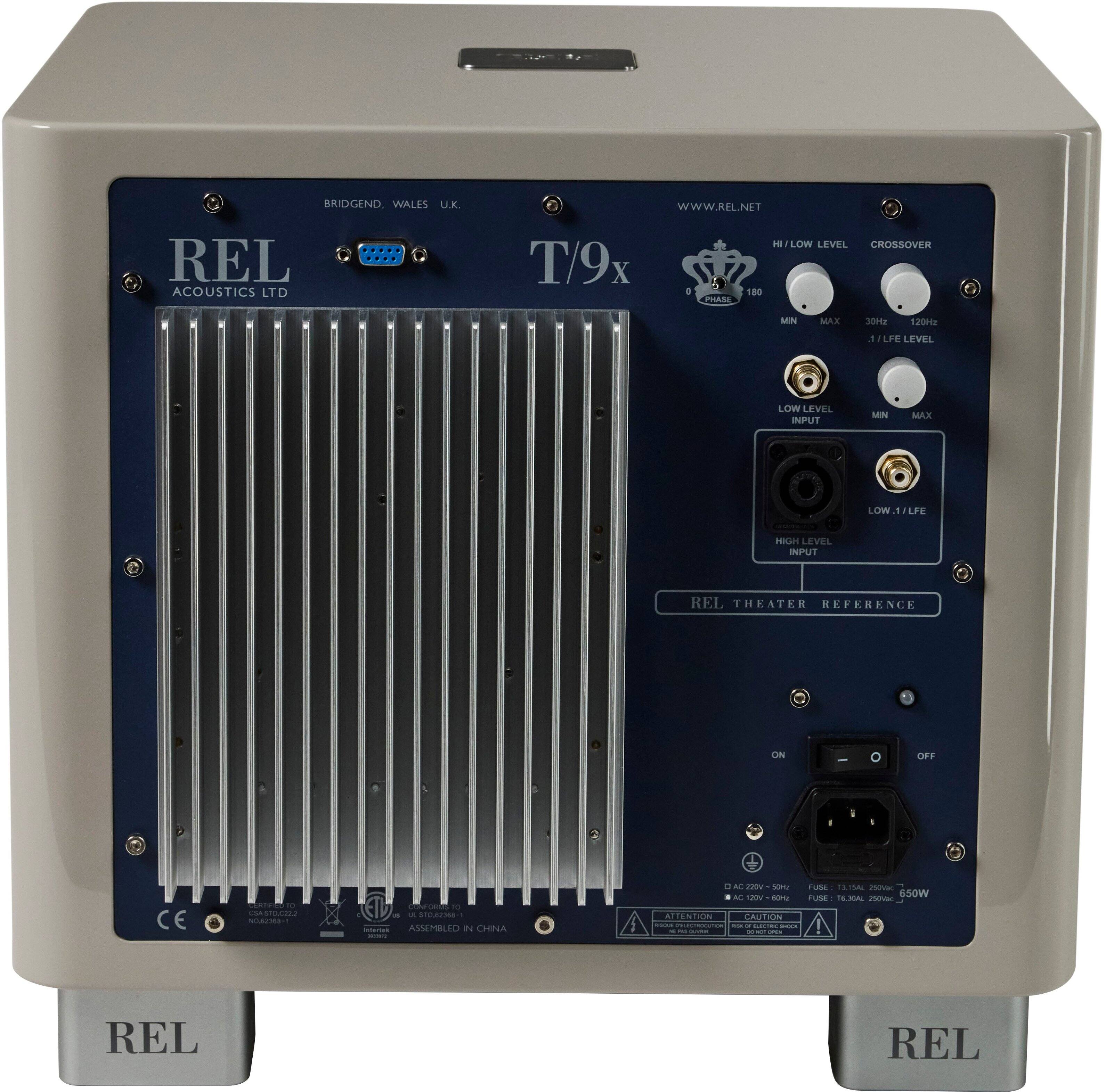 The text on the image reads:

"Bridgend, Wales, U.K. REL Acoustics Ltd. WWW.REL.NET. He/Low Level Crossover T/9x 4 180 Phase Min Max 02 120Hz. Fuse Level Low Level Input Min Xam Low 1 Lee High Level Input REL Theatrr Reference On/Off Ce. - .C.. - sIuzzMa Assembly 2 Crna. AL J S ru 1MA n s50W AC 120V S TUSE 161A n Mendon. Caution. - REL."
