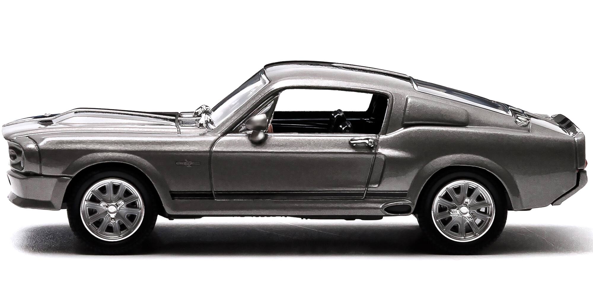 Angle. Greenlight - 1967 Ford Mustang Custom "Eleanor" Gray Metallic with Black Stripes "Gone in 60 Seconds" (2000) Movie 1/43 - Gray Metallic.