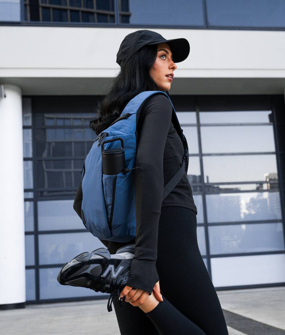 Alt View 10. ALPAKA - Crossbody Sling Bag 7.5L (Right Shoulder) for Men, Fits 11" Tablet, Phone Sleeve, Bottle Pocket, Luggage Pass-Through - Blue Axoflux 210D.