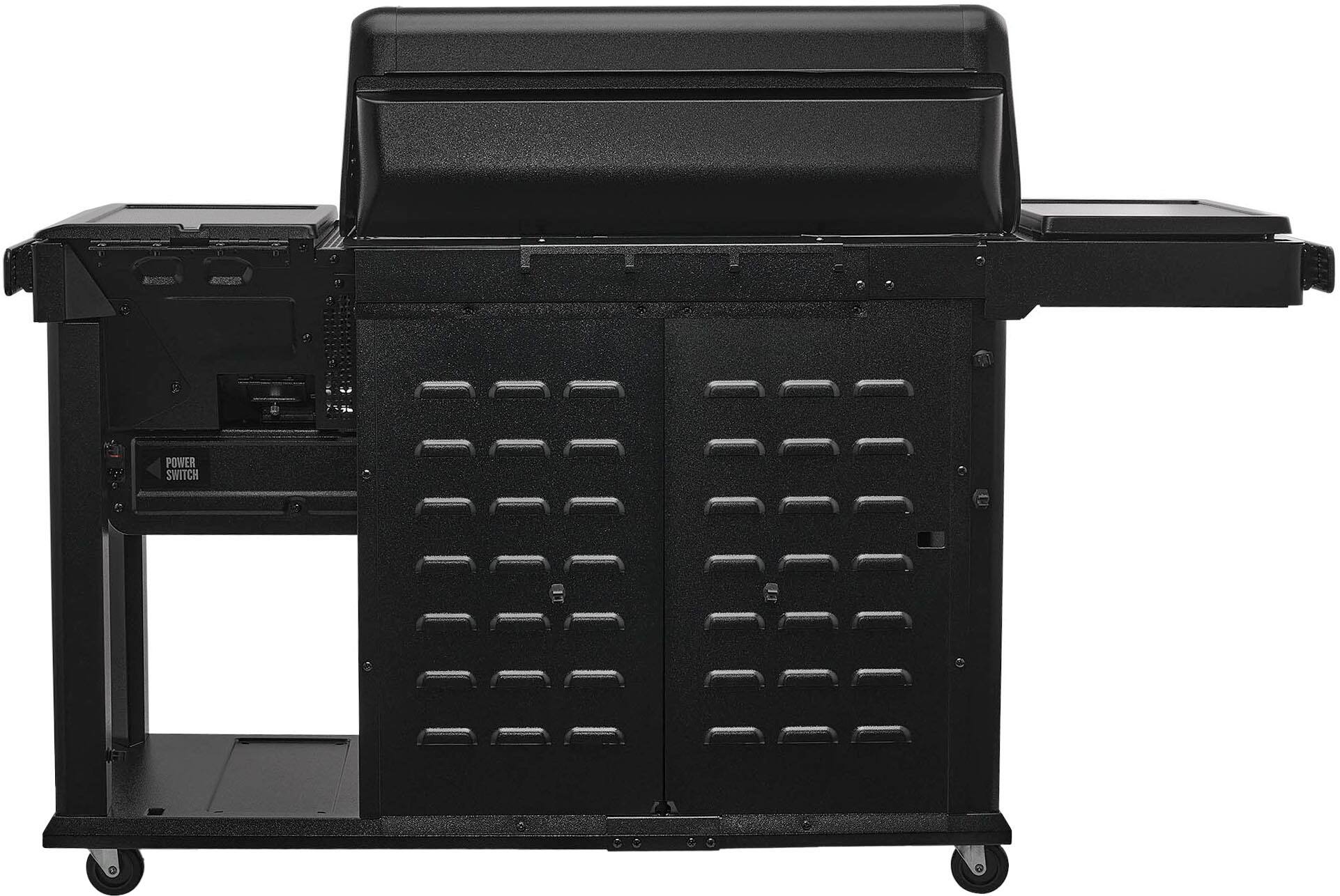 The image shows a black machine with a power switch on the left side.