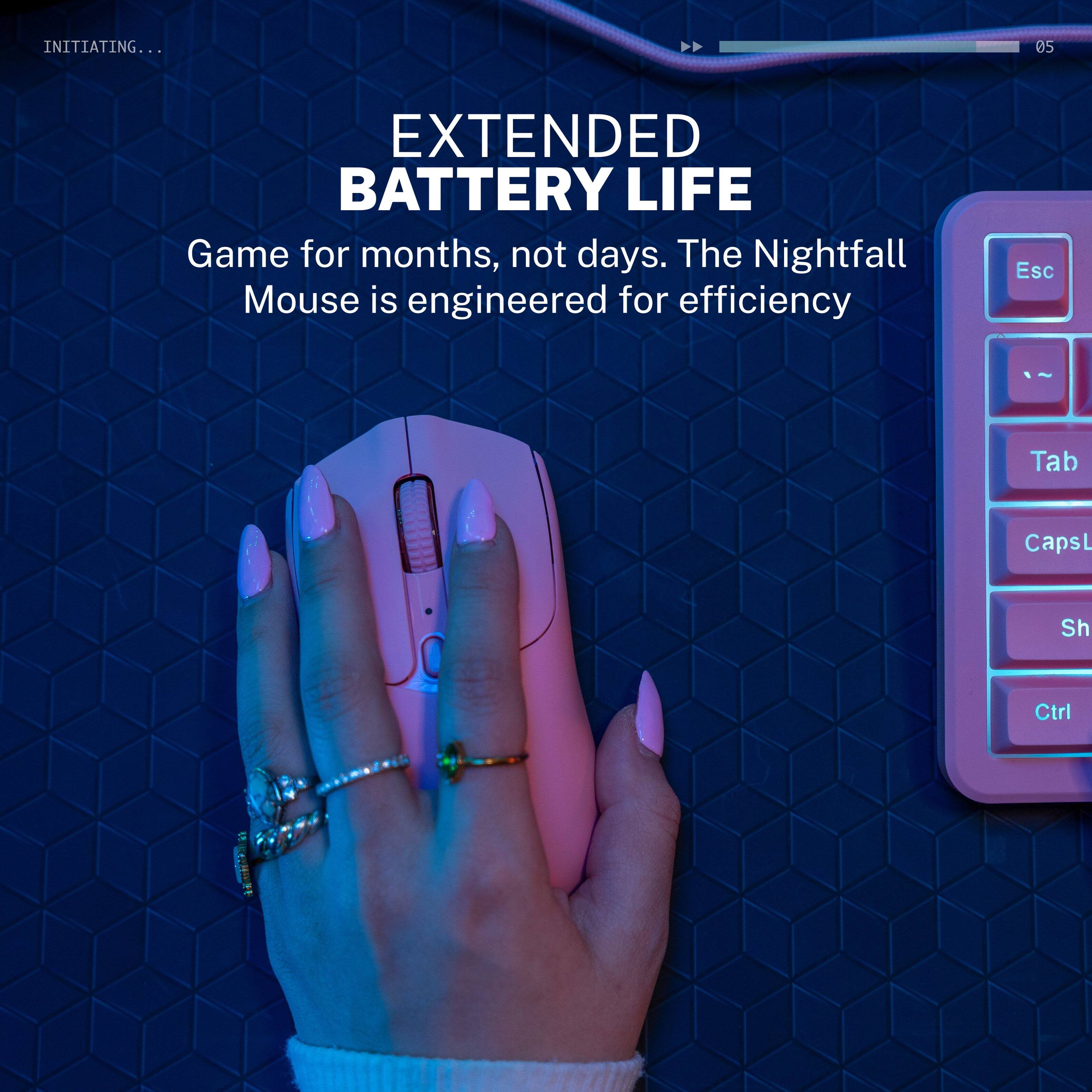 INITIATING...  
05  
EXTENDED BATTERY LIFE  
Game for months, not days. The Nightfall Mouse is engineered for efficiency  

Esc Tab CapsL Sh Ctrl
