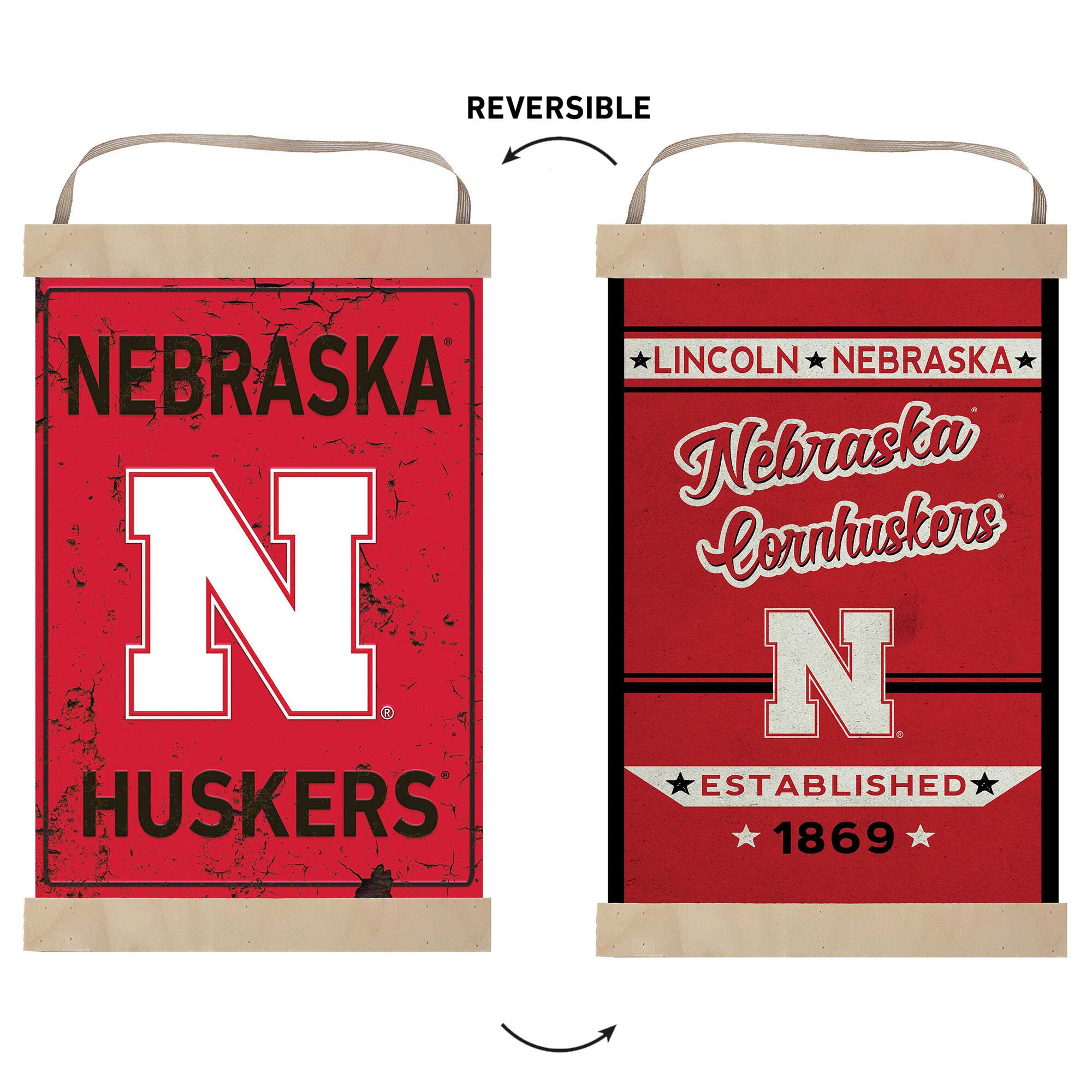 REVERSIBLE  
NEBRASKA  
HUSKERS  
LINCOLN NEBRASKA  
Nebraska Cornhuskers  
ESTABLISHED 1869
